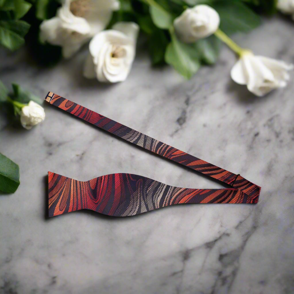 Flat lay of bow tie and matching pocket square showing texture and color contrast