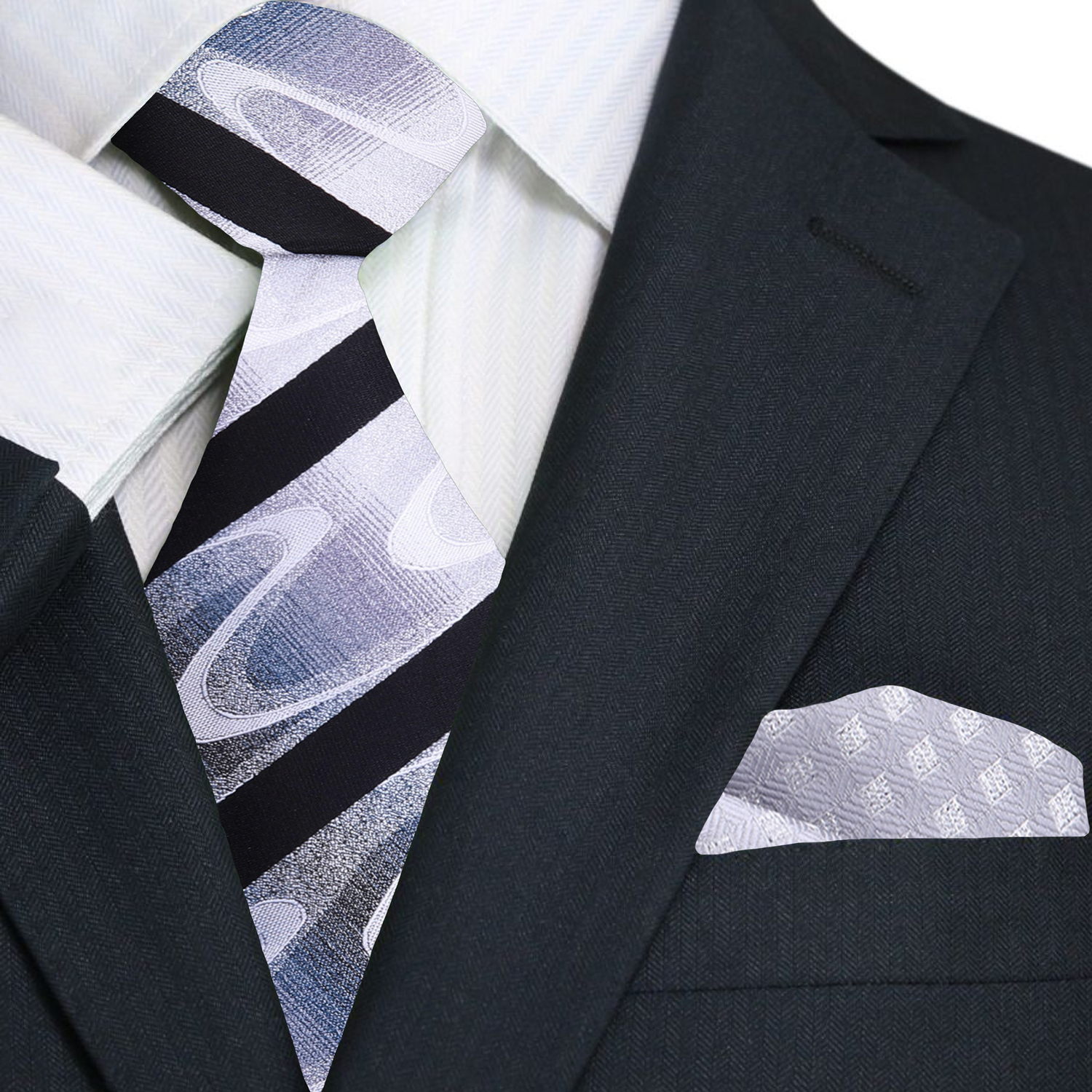 Close-up of the Rothmere necktie against a white dress shirt, showcasing its intricate design.
