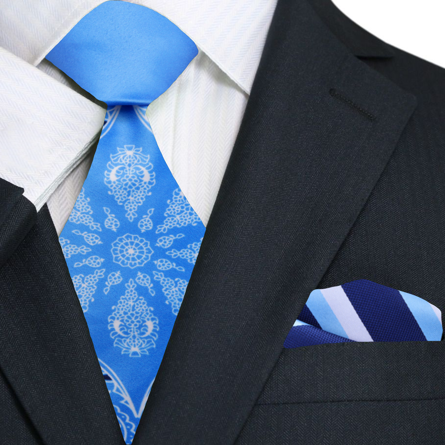 Close-up of the intricate paisley pattern on a blue silk necktie