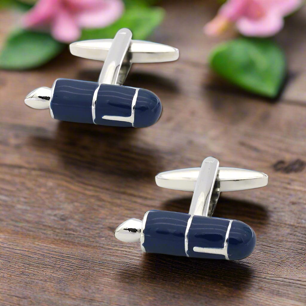 Close-up of Literary Elegance Fountain Pen Cufflinks showcasing blue enamel and chrome accents.