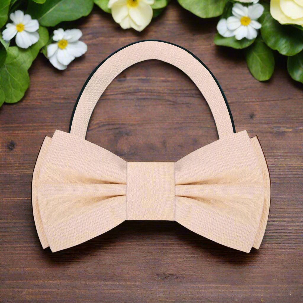 Fashionable man adjusting a deep red linen bow tie, showcasing effortless elegance