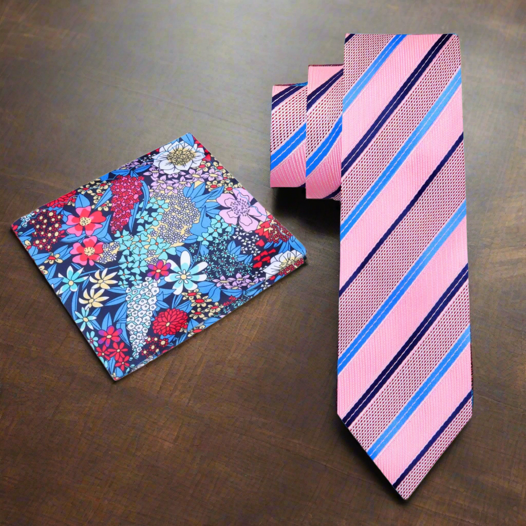 Man wearing pink striped tie with light blue shirt, ready for a wedding or meeting