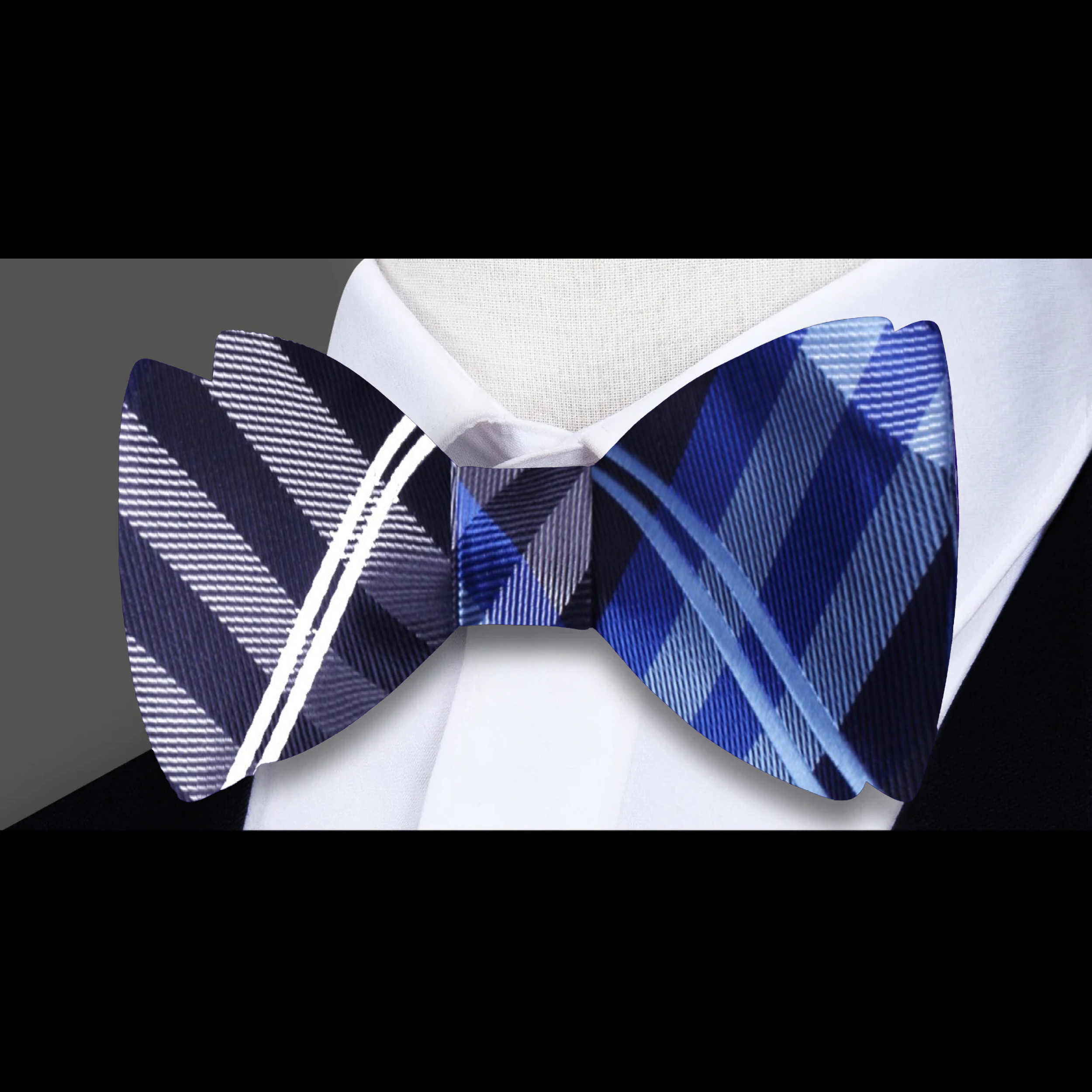 Men tying a plaid bow tie in a modern office setting