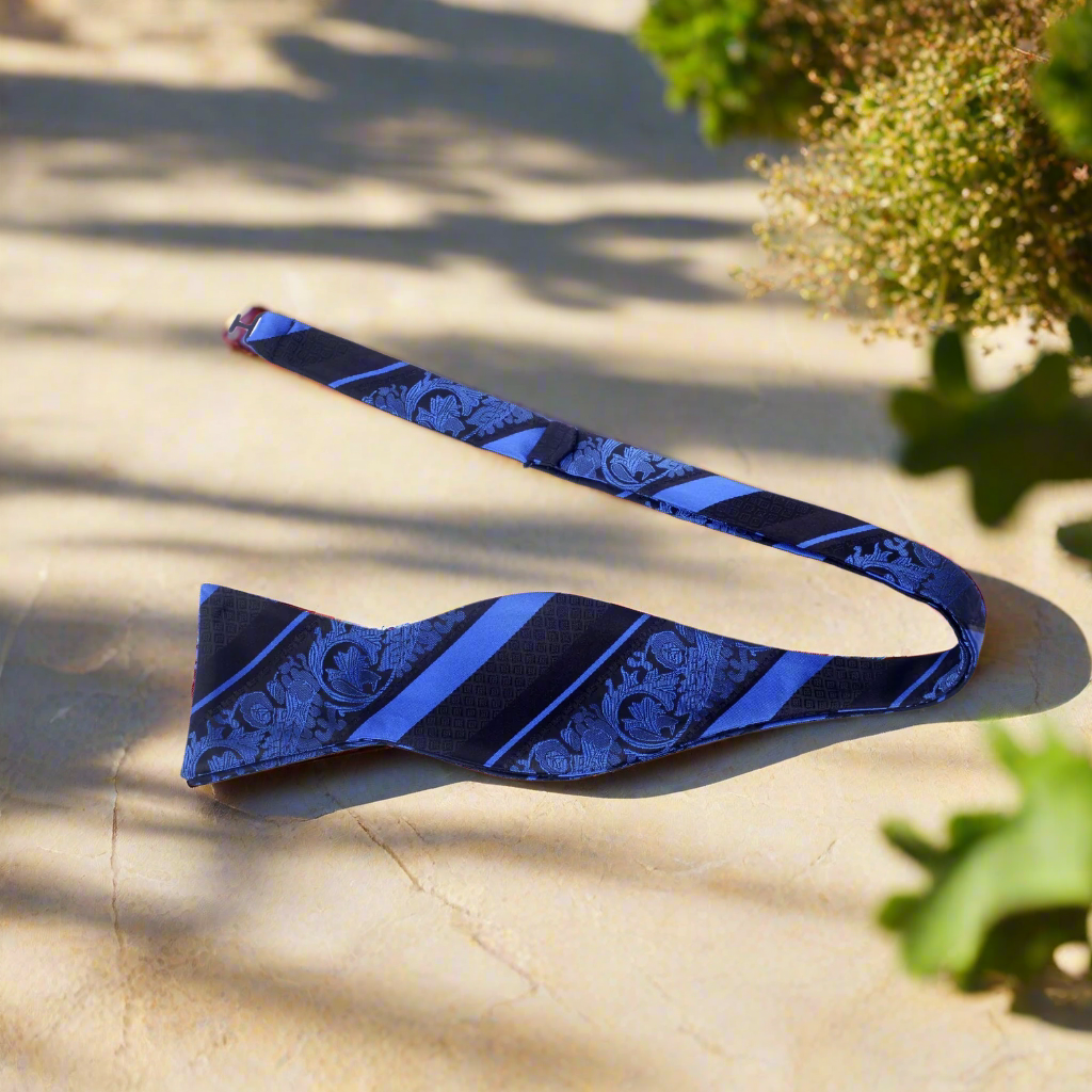 Fashionable floral bow tie set with matching pocket square on a dress shirt