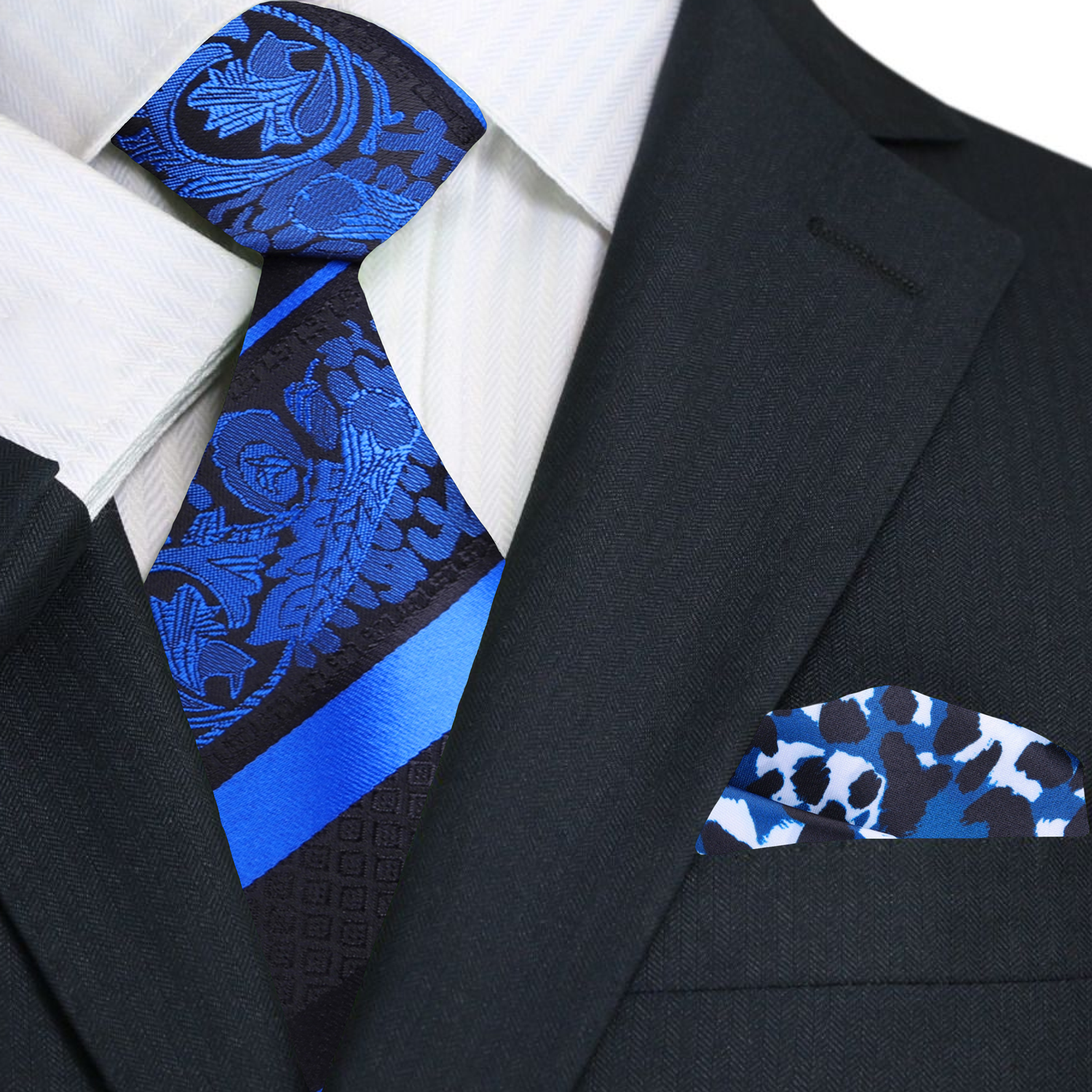 Detail shot of the luxurious silk fabric and intricate paisley pattern on the tie