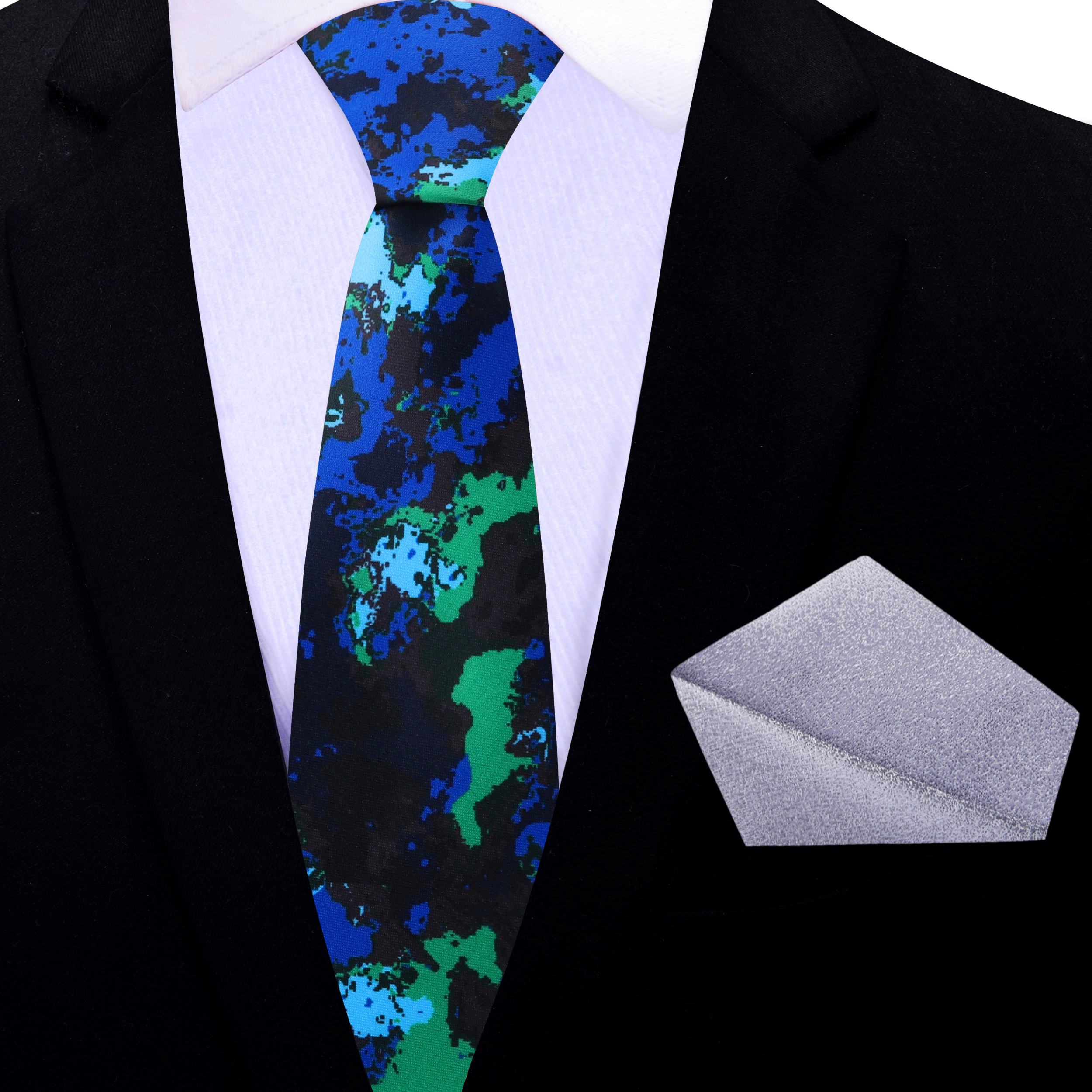 Flat lay of the silk necktie with the matching pocket square on a neutral background