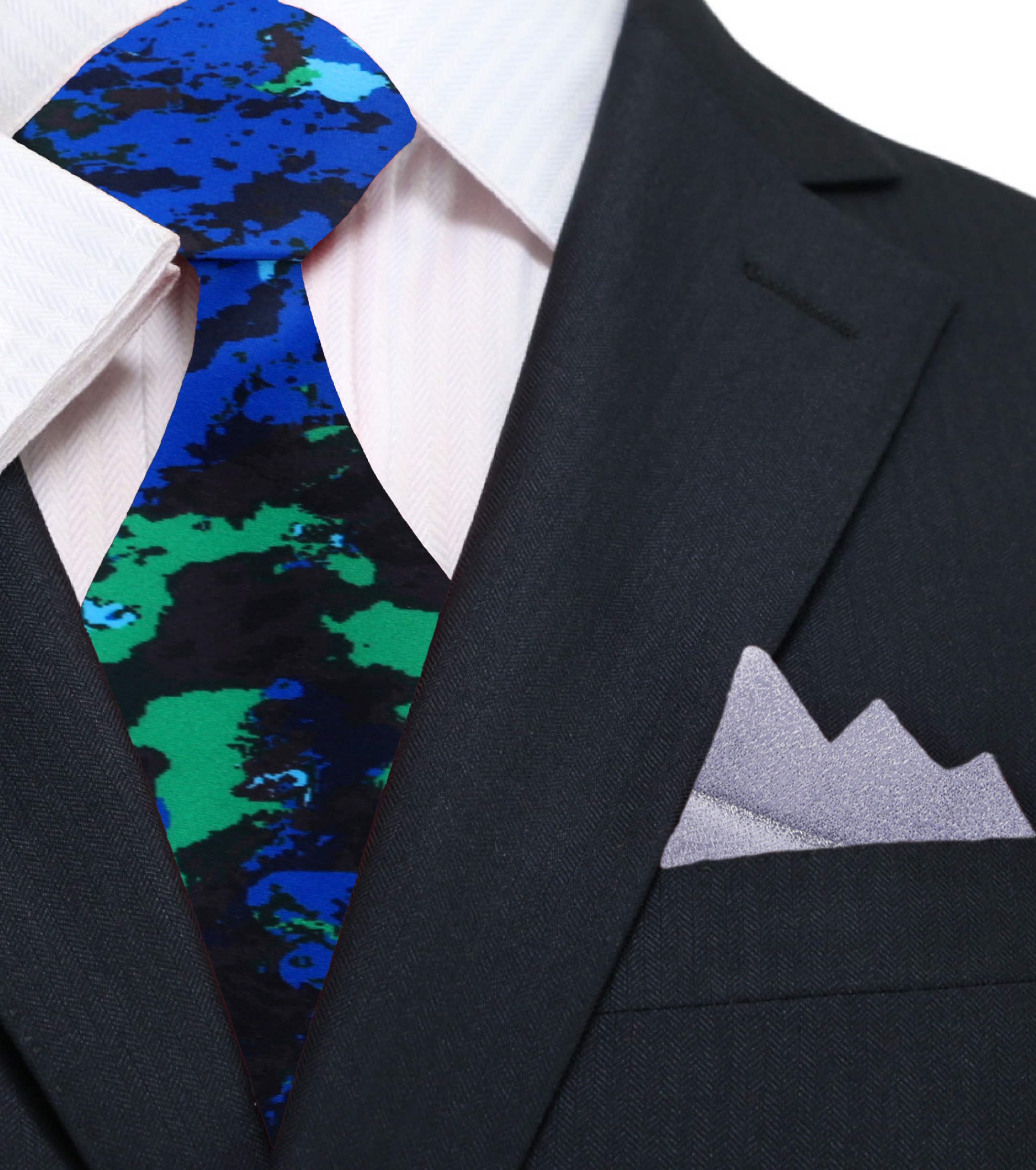 Model wearing the artistic silk tie paired with a white shirt and navy blazer for a formal event