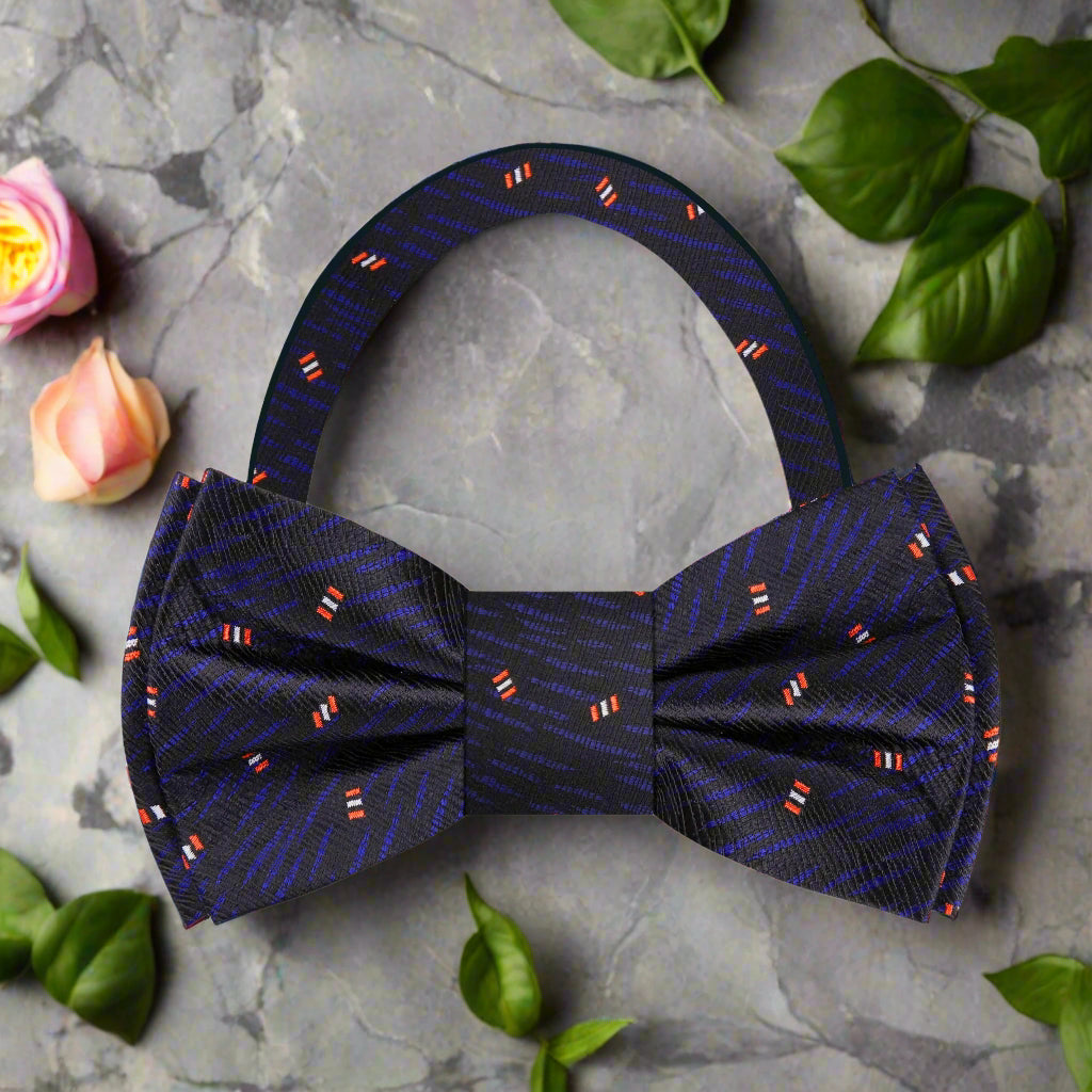 Cosmic Elegance Bow Tie showcasing red and white satellites against a dark blue background, perfect for formal events.
