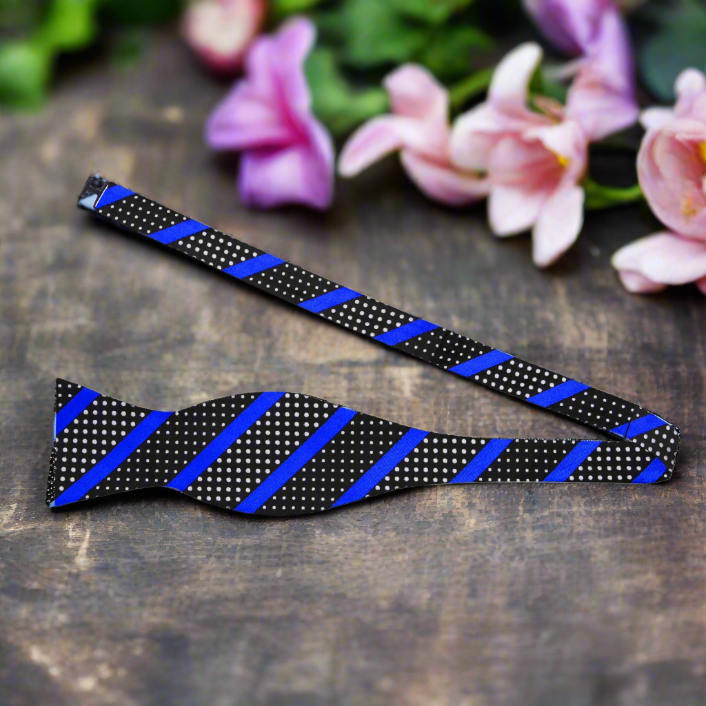 Chic striped polka dot bow tie in vibrant colors, styled with a white dress shirt.