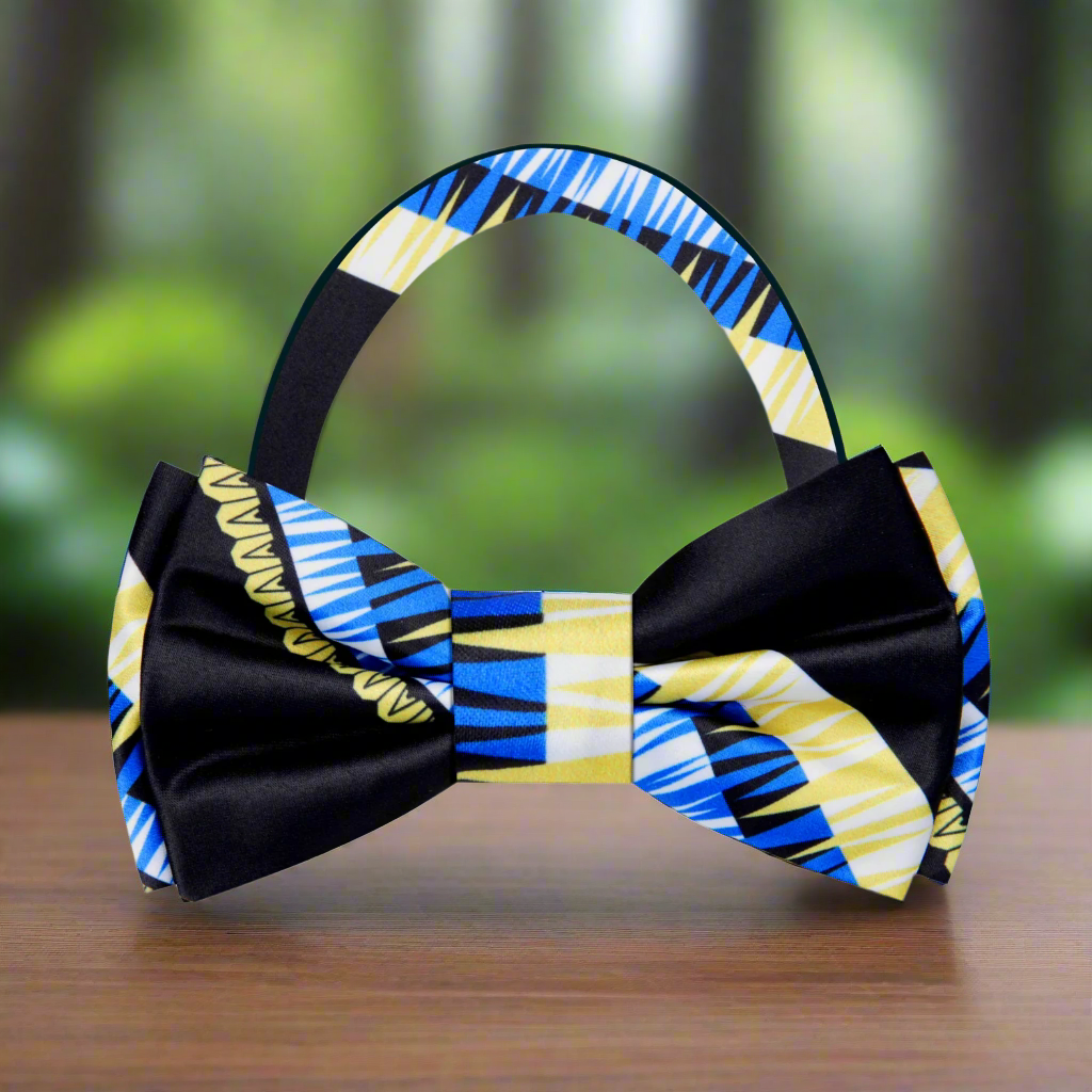 Close-up of abstract pattern silk bow tie for men in black, blue, and yellow