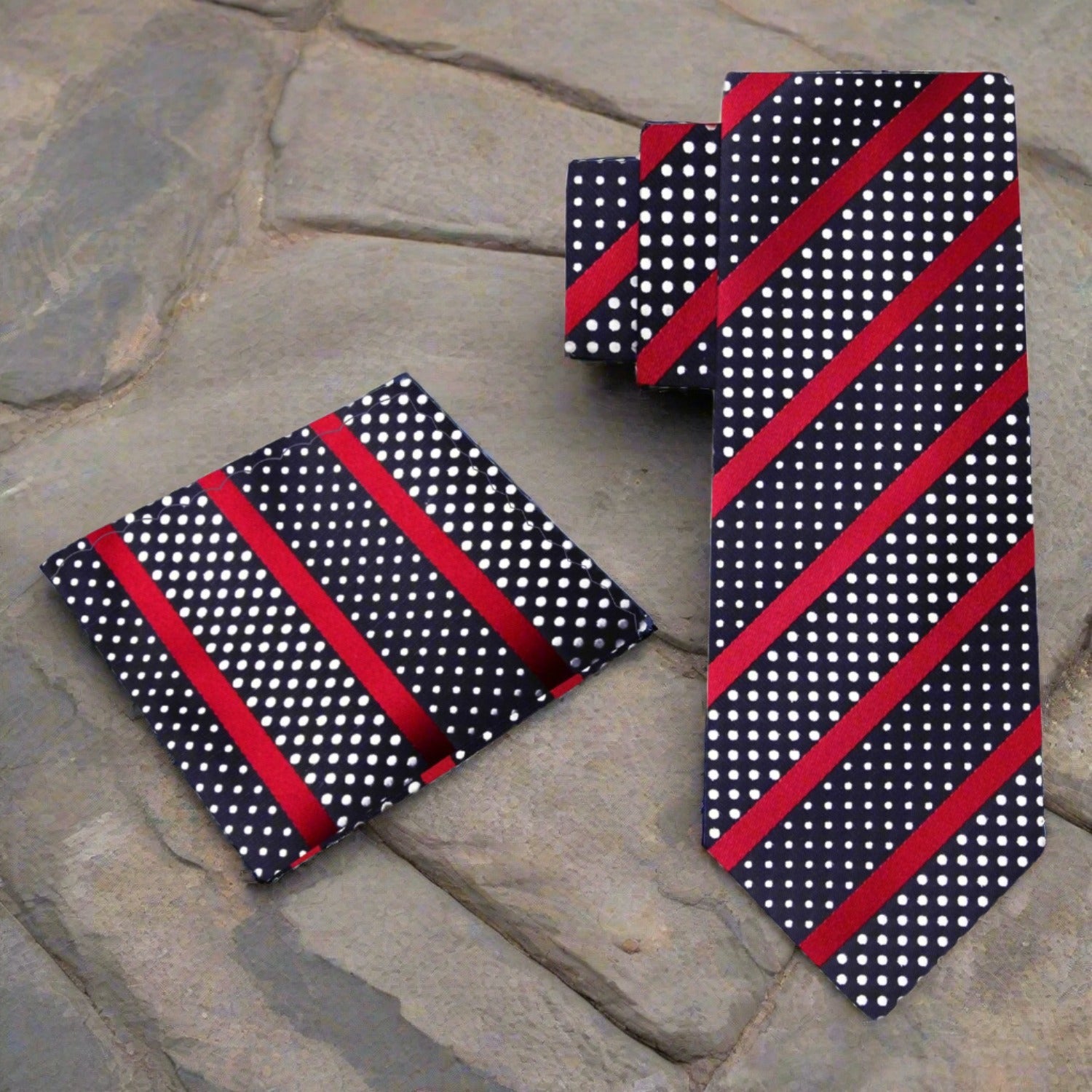 Man wearing a stylish black silk necktie with subtle pattern at a formal event
