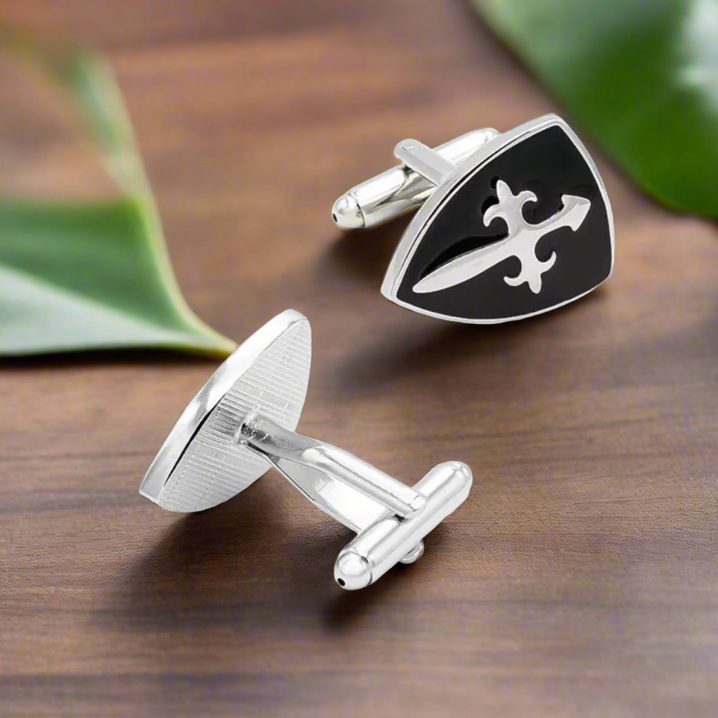 Display of crucifix cufflinks in a gift box, ideal for special occasions like confirmations and weddings.