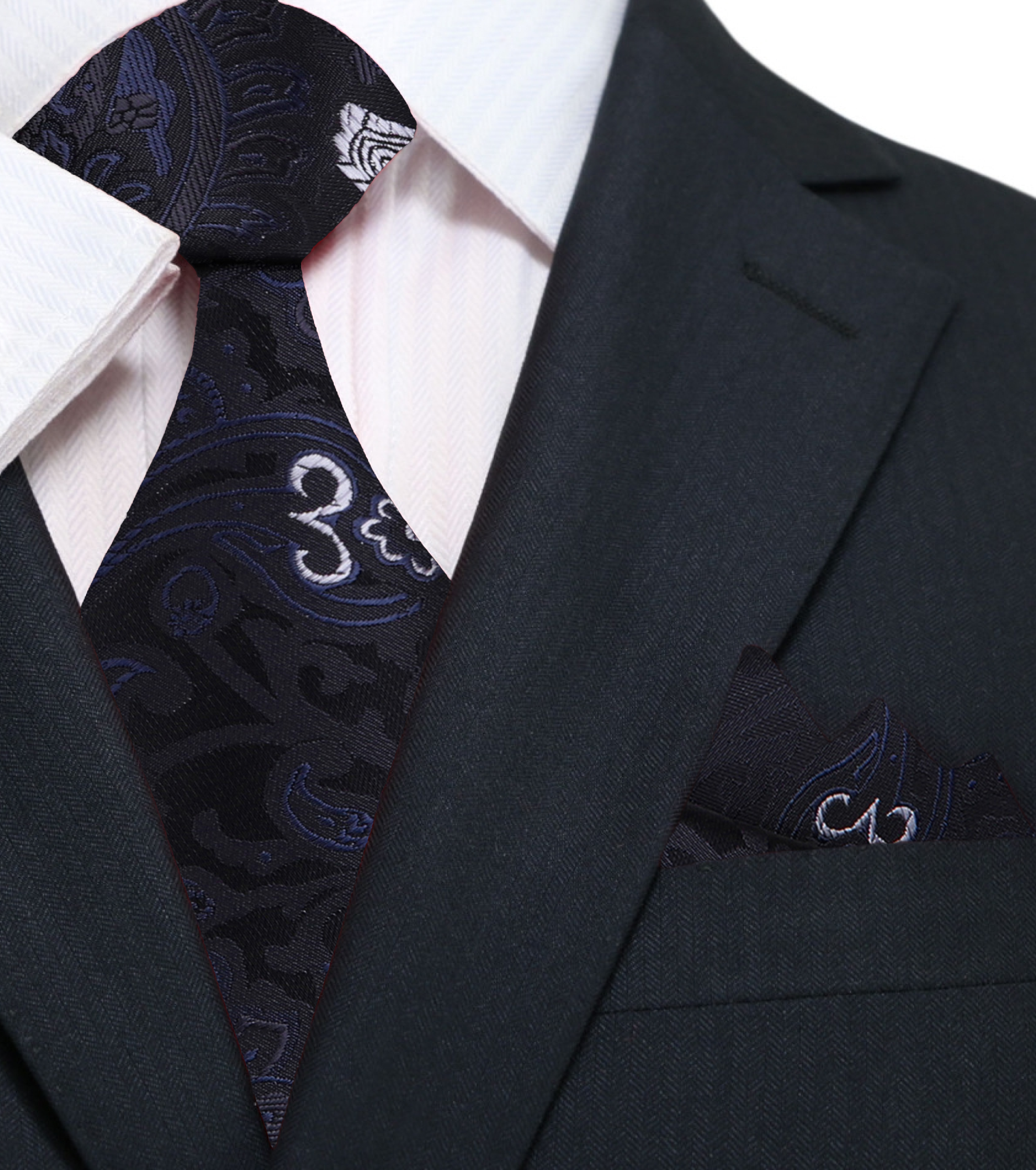 Close-up of paisley tie pattern in dark blue silk, styled for business suit pairing
