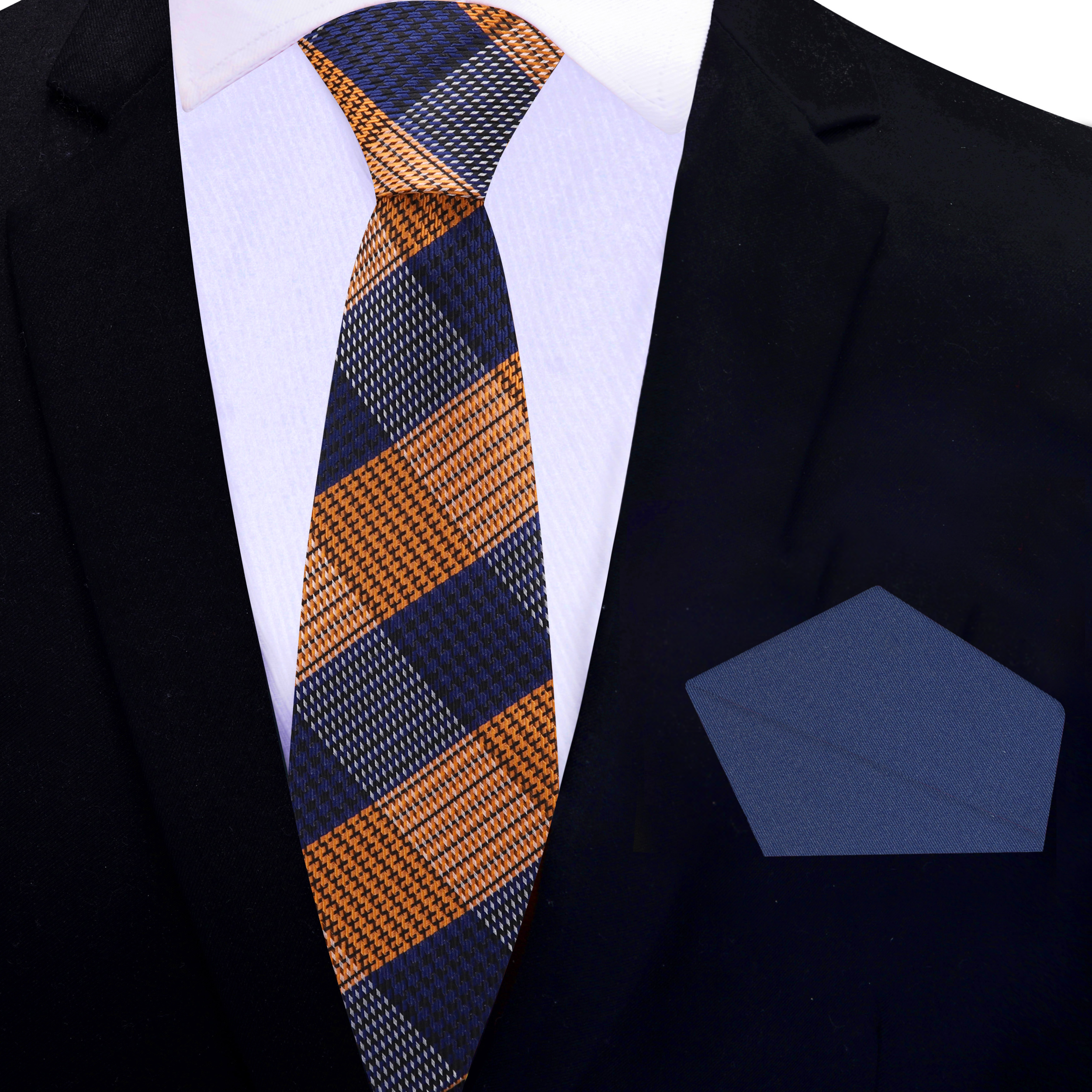 Elegant orange plaid silk necktie displayed on a mannequin for wedding attire