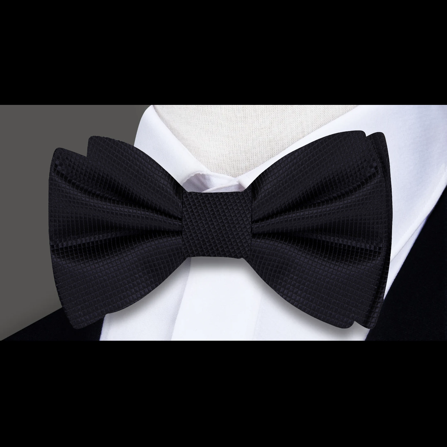 Classic Solid Black Bow Tie displayed on a white background.