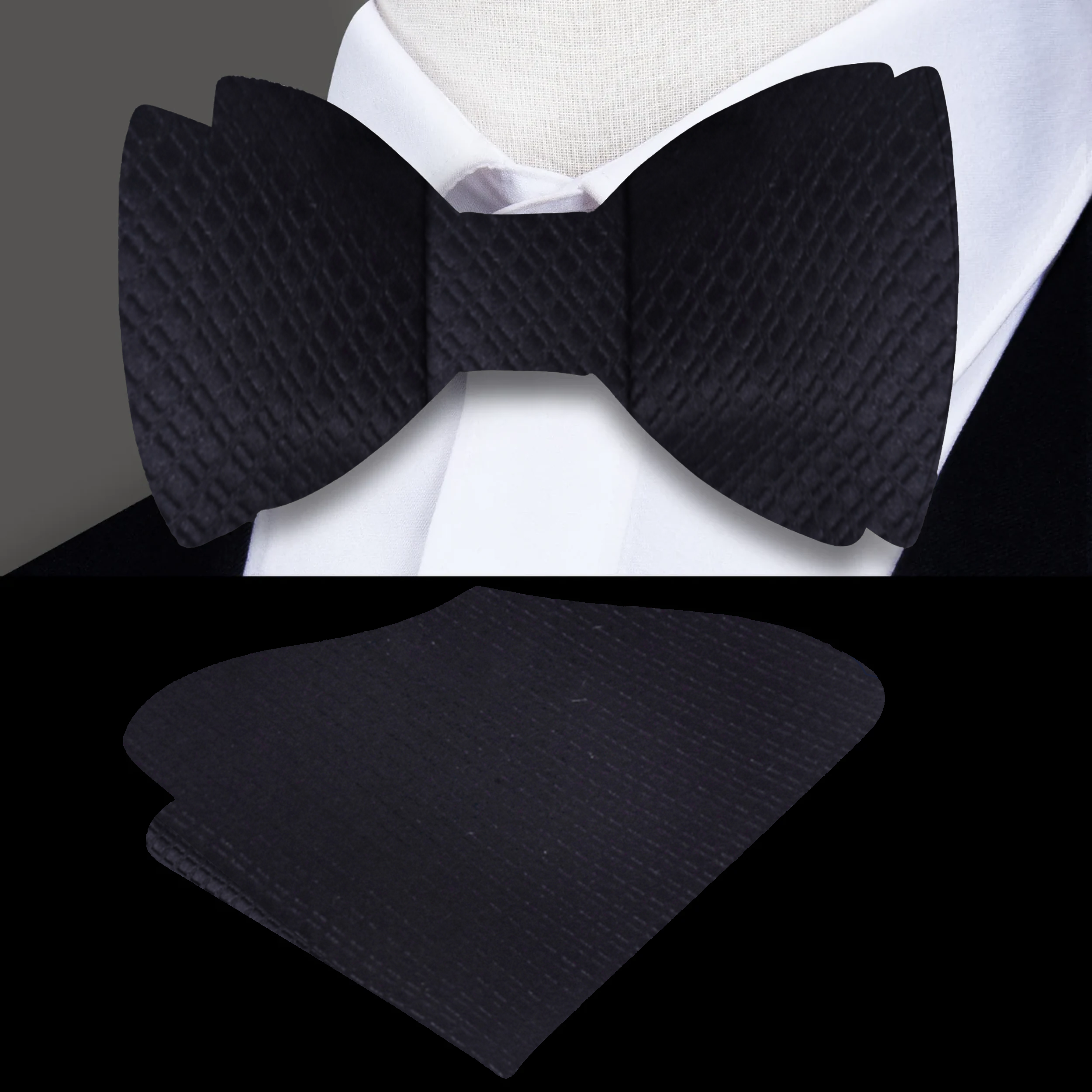 Classic black self-tie bow tie paired with a tuxedo, ideal for formal events.