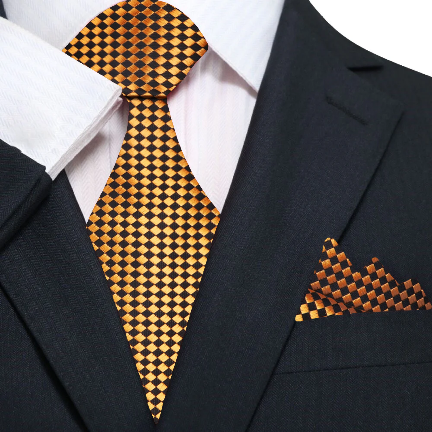 Flat lay of the Noble Gold and Black Geometric Necktie alongside a charcoal grey suit and dress shoes.