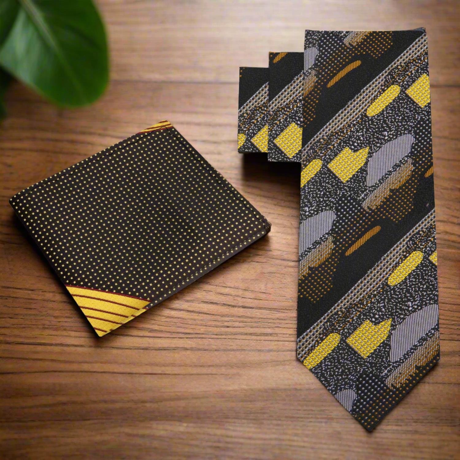 Stylish necktie with abstract pattern displayed on a mannequin, showcasing its elegant design and color palette.