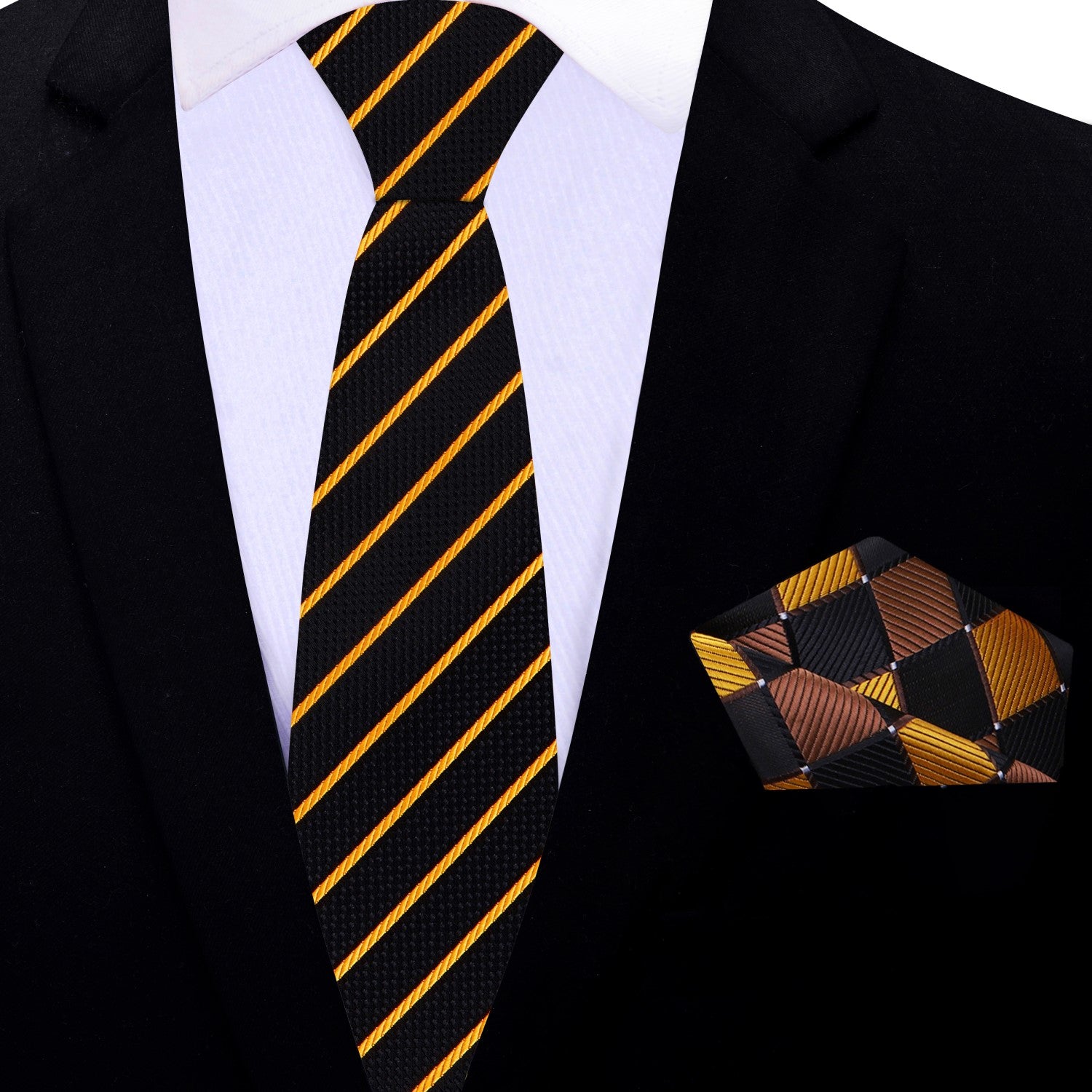 Black silk tie with gold stripe detail displayed beside matching silk pocket square
