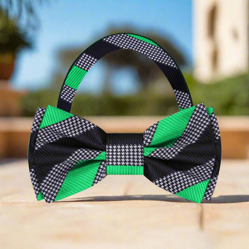 Model wearing the green and white striped silk bow tie at a wedding