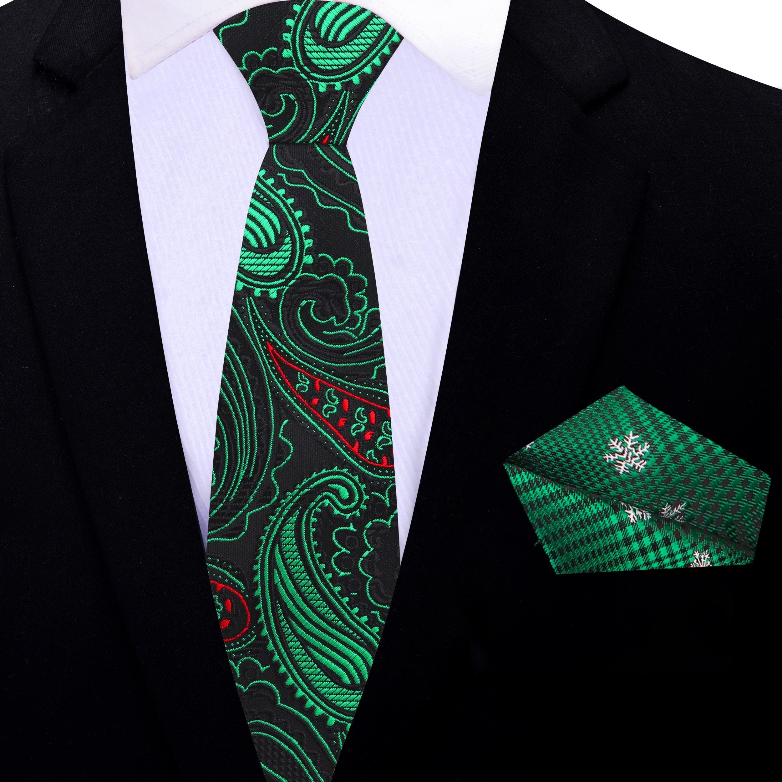 Close-up of stylish paisley Christmas necktie in black with red and green accents