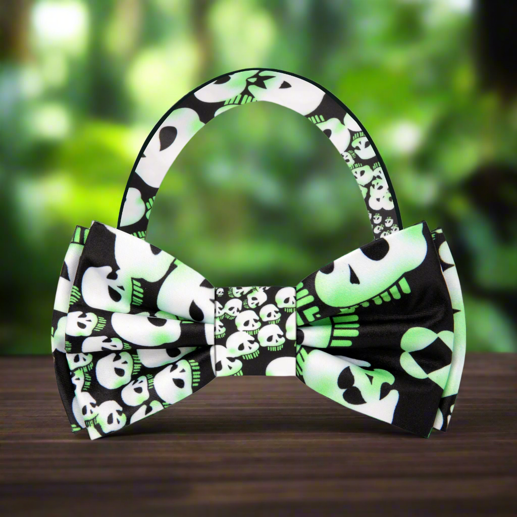 Close-up of the swirling skulls pattern on a silk bow tie for Halloween