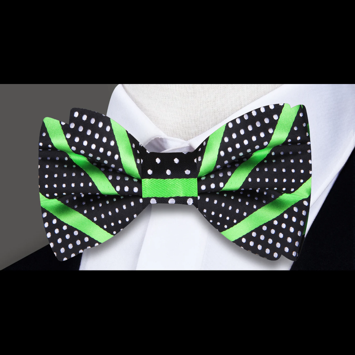 Chic striped polka dot bow tie in vibrant colors, styled with a white dress shirt.