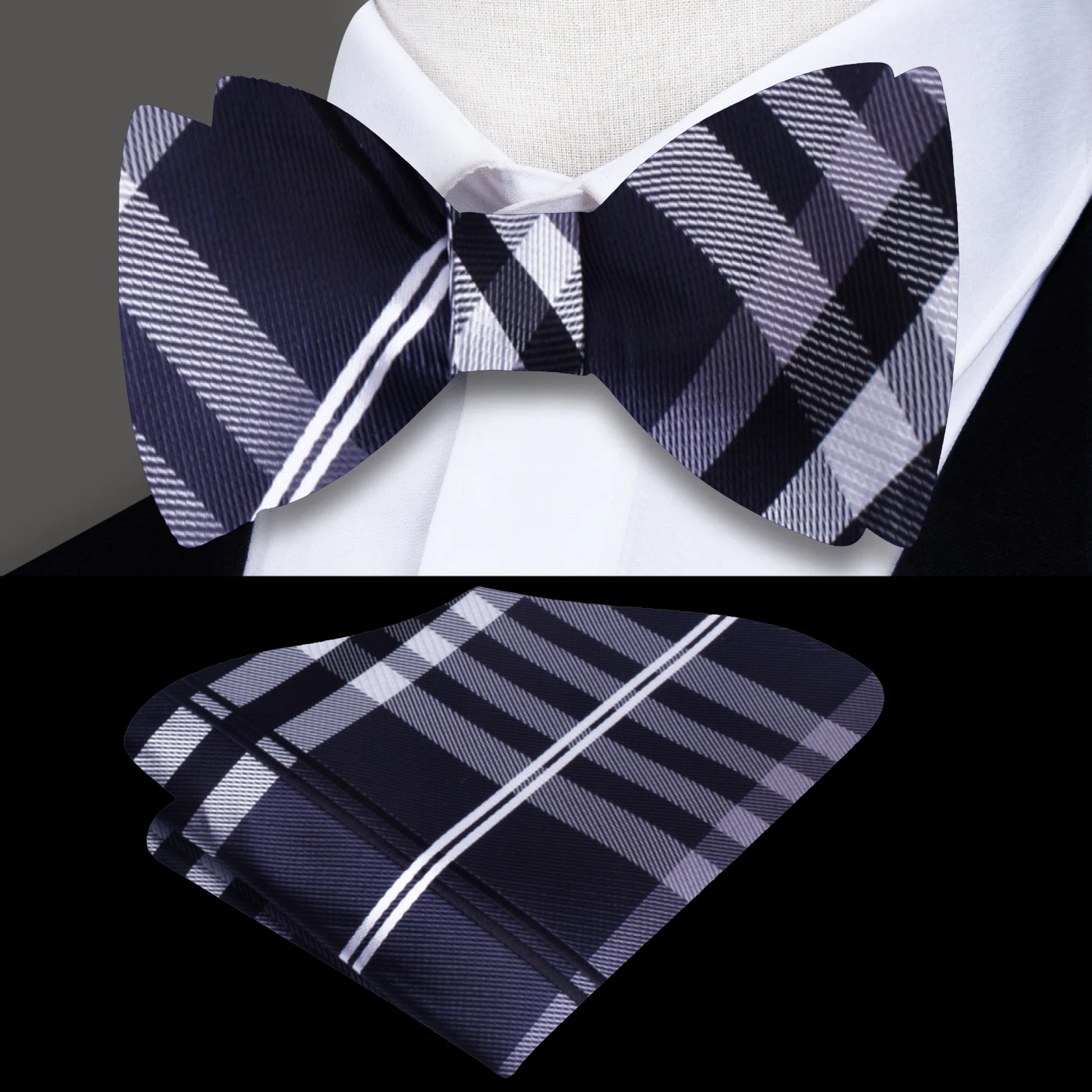 Close-up of a black and green plaid bow tie on a model