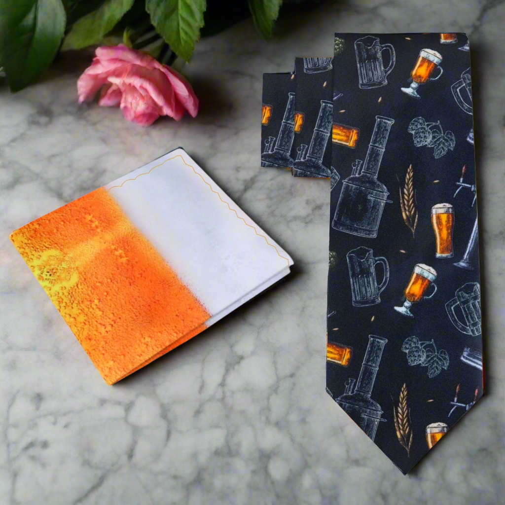 Close-up of beer print silk necktie with hops and brewing tools