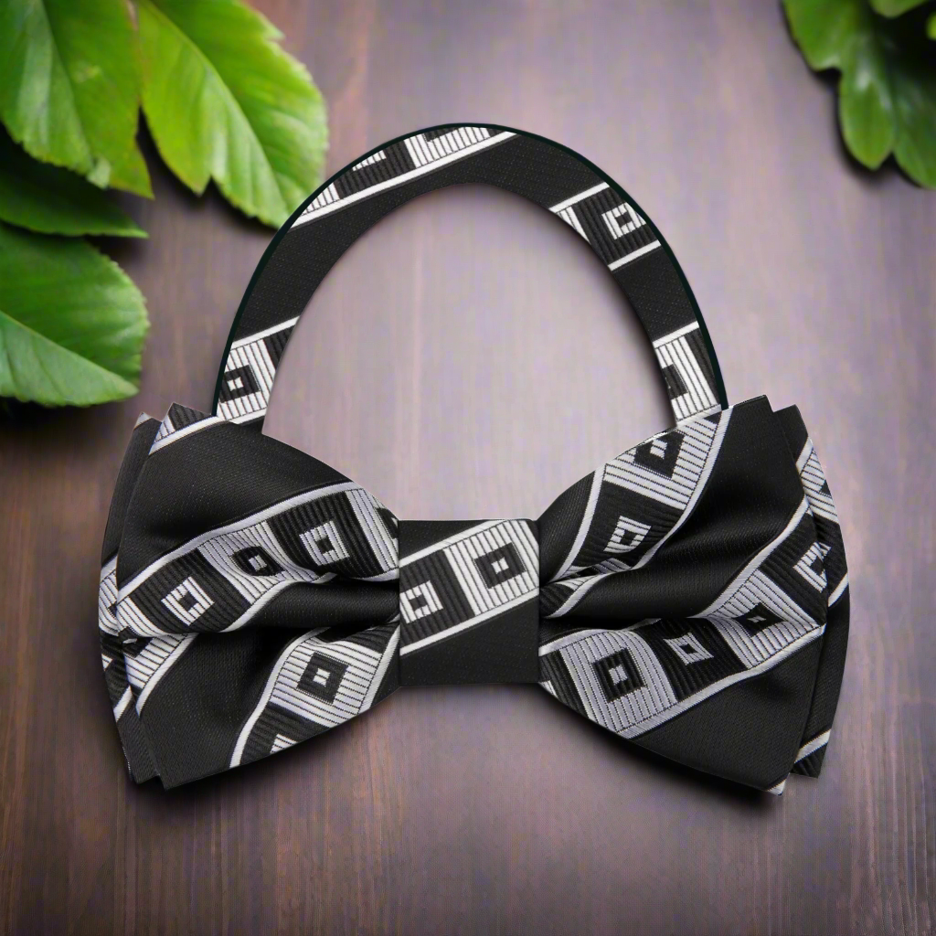Front view of stylish silk geometric bow tie in black and silver for formal events