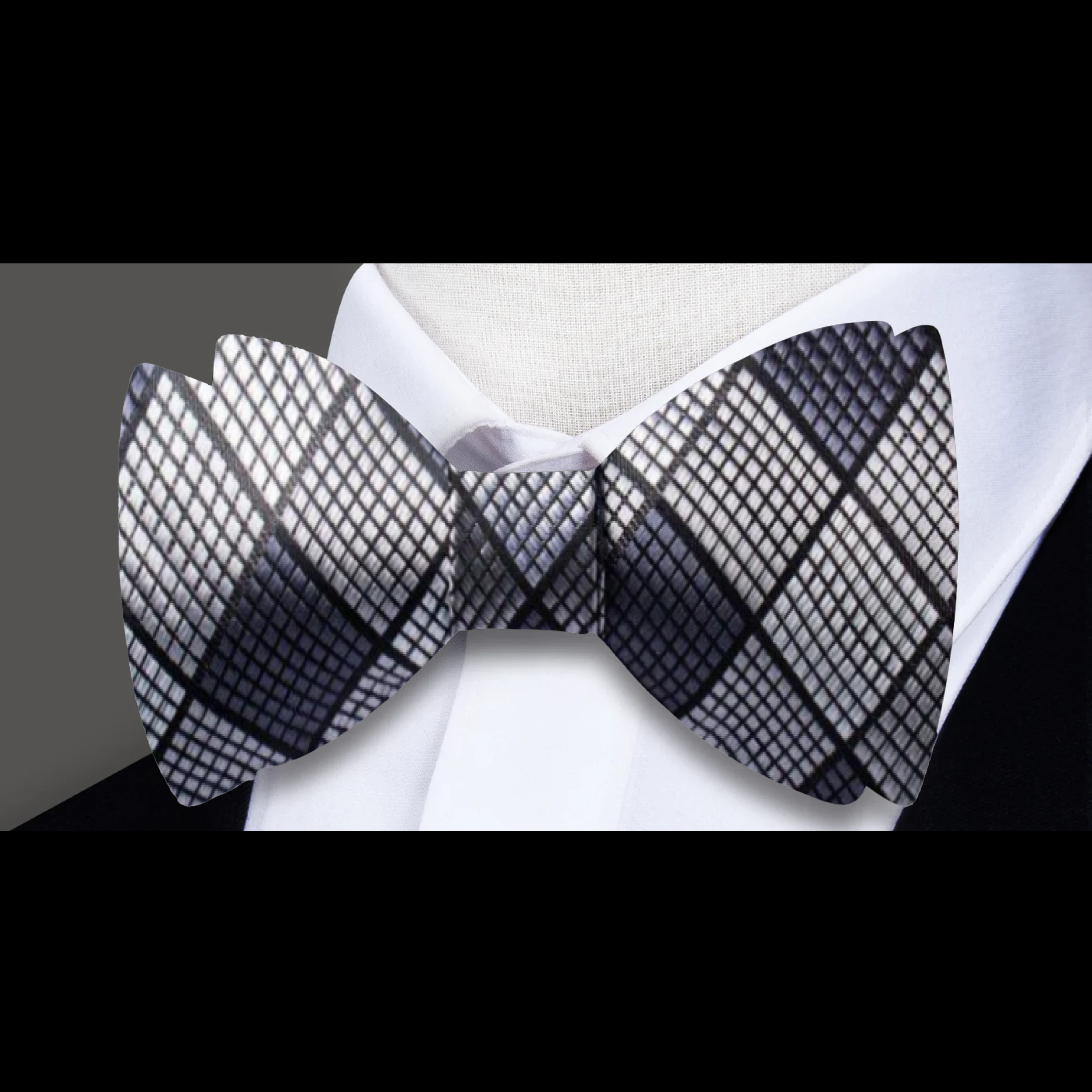 Front view of a geometric silk bow tie in pastel colors, suitable for weddings