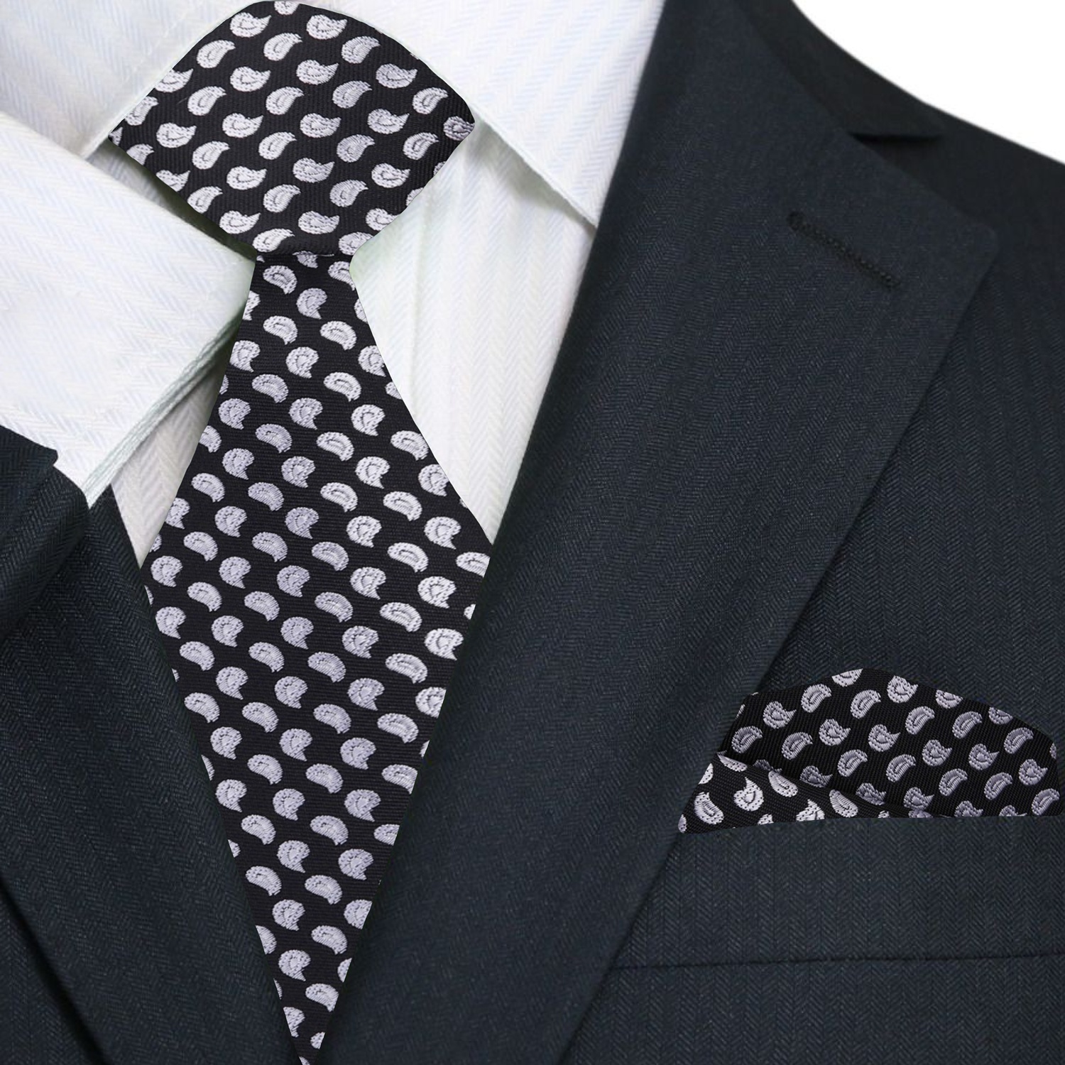 Close-up of the paisley pattern on a black necktie, perfect for formal events.