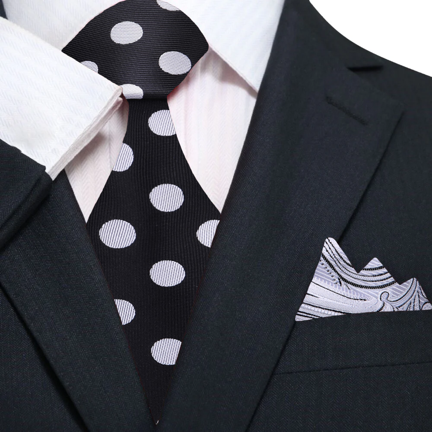 Close-up of black and grey polka dot pattern on mens necktie