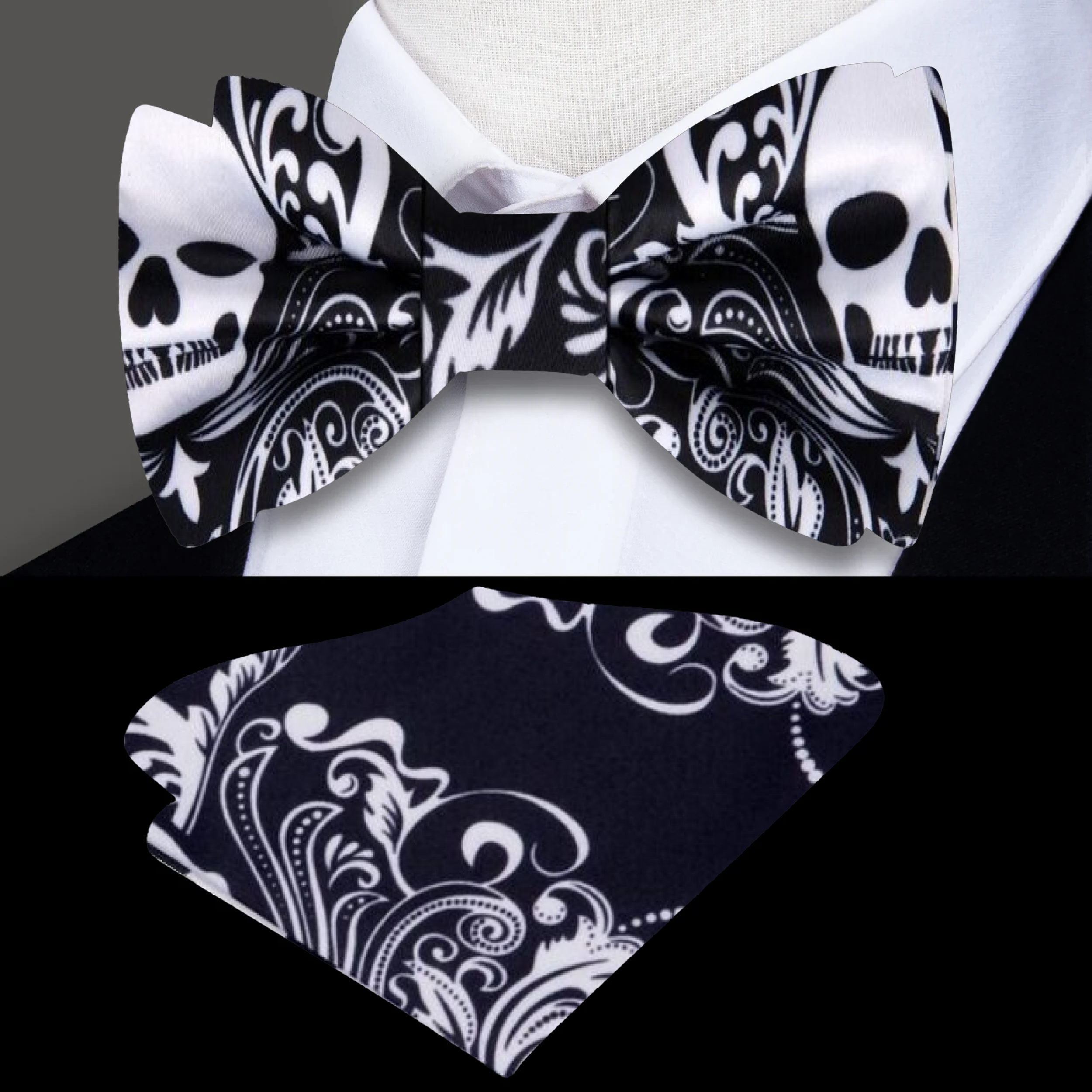 Close-up of black gothic skull motif bow tie showing intricate design details