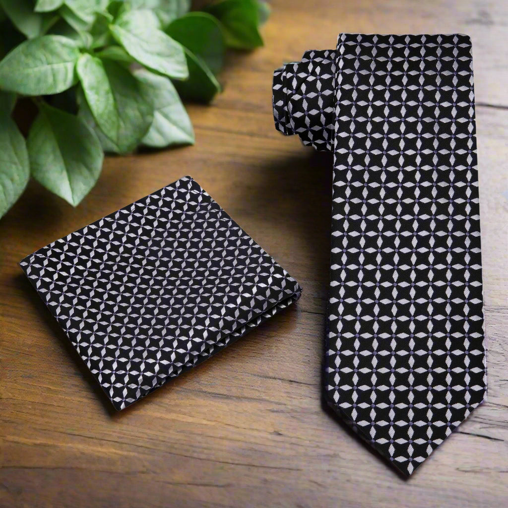 Man wearing a silk tie with geometric pattern and matching shirt