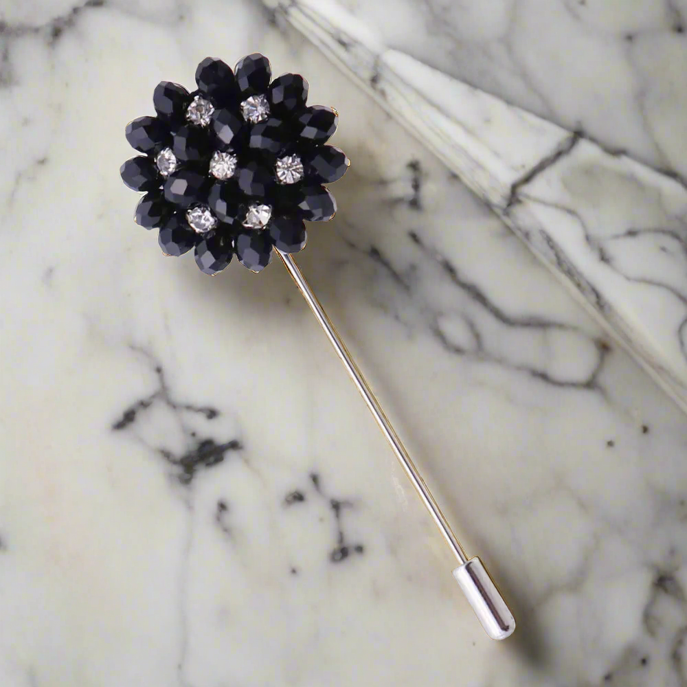 Lapel pin with colorful stones on a suit jacket for formal events