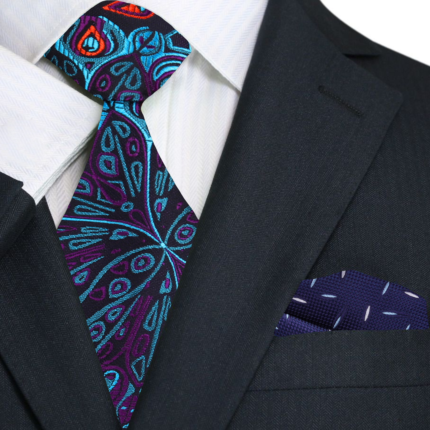 Model wearing the peacock feather tie with a charcoal grey suit at a cocktail party.