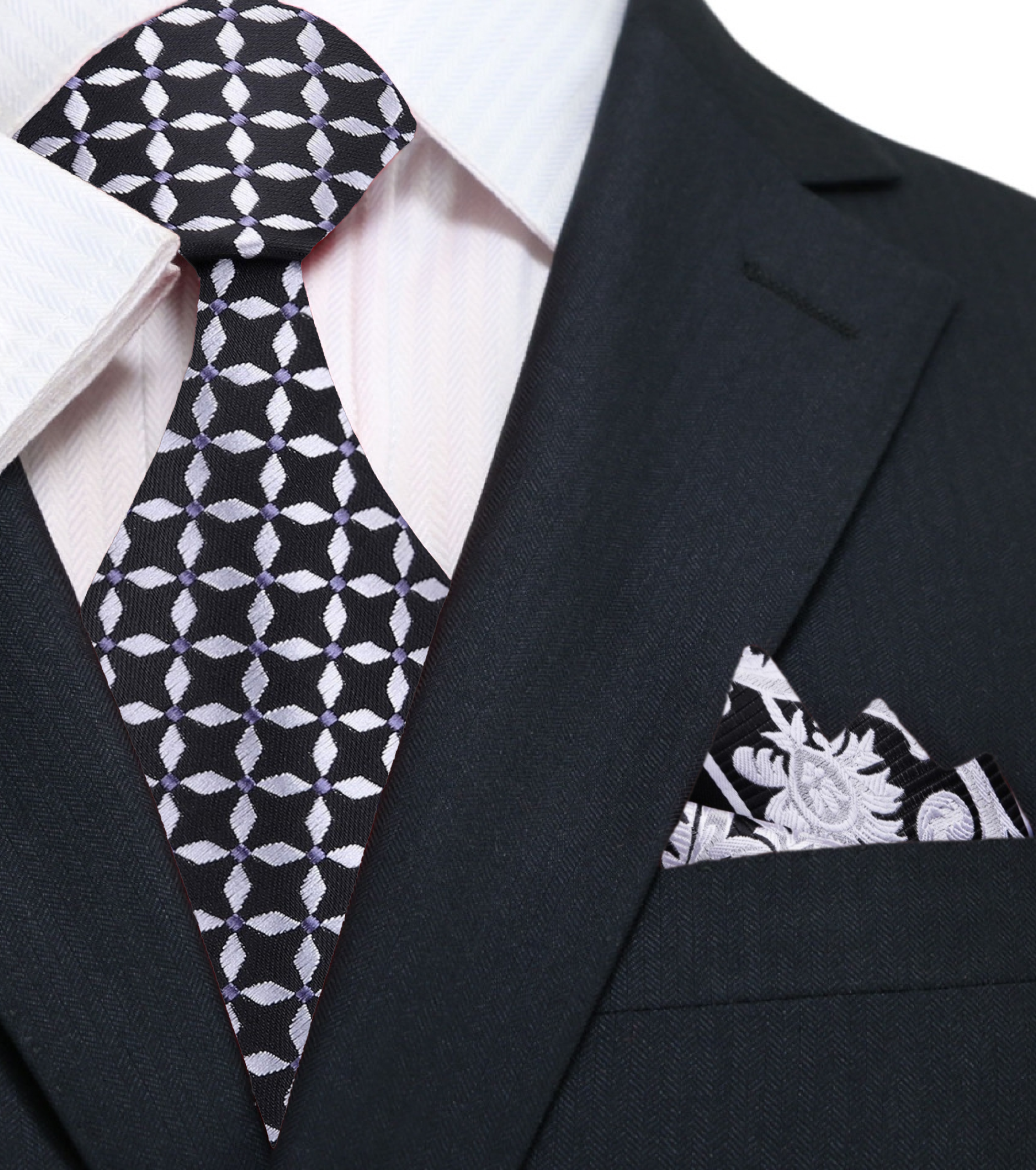 Man wearing a silk tie with geometric pattern and matching shirt