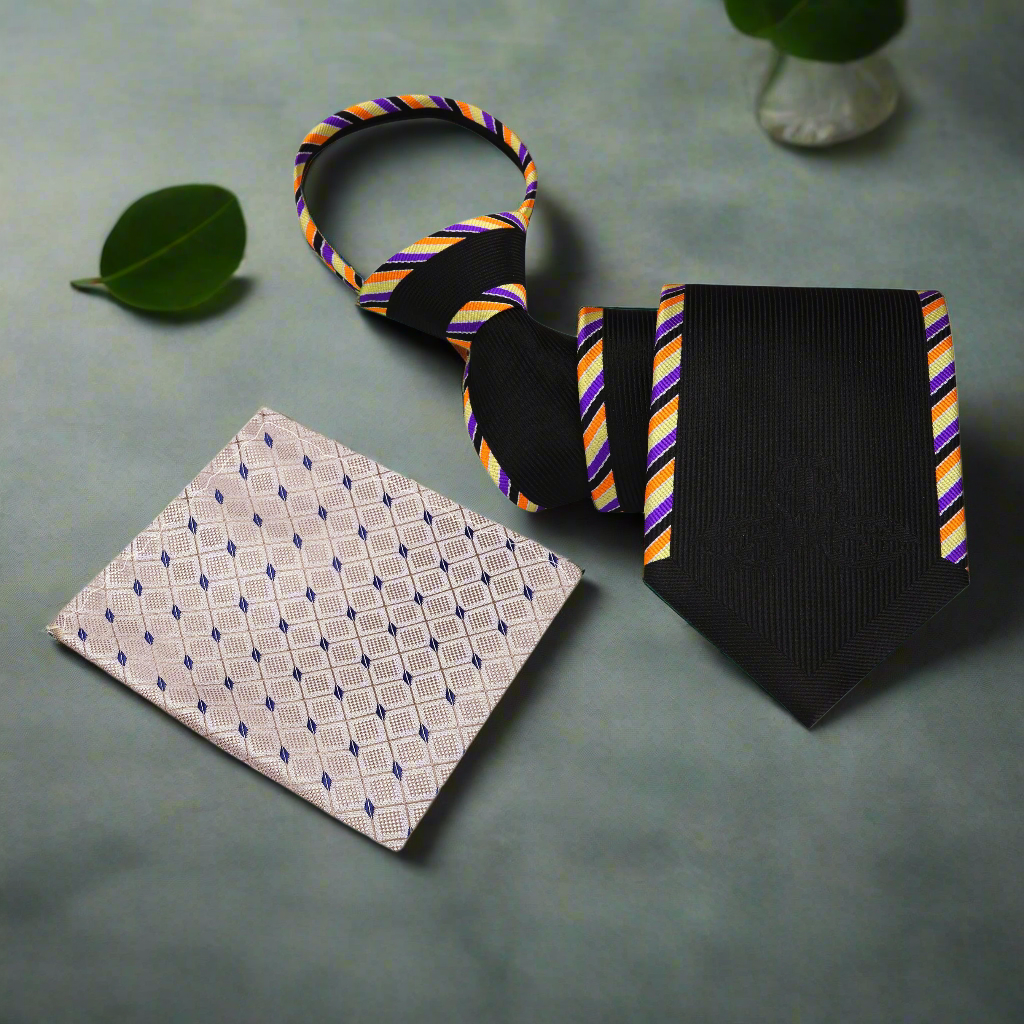 Detailed shot of the silk fabric and abstract border design on the necktie