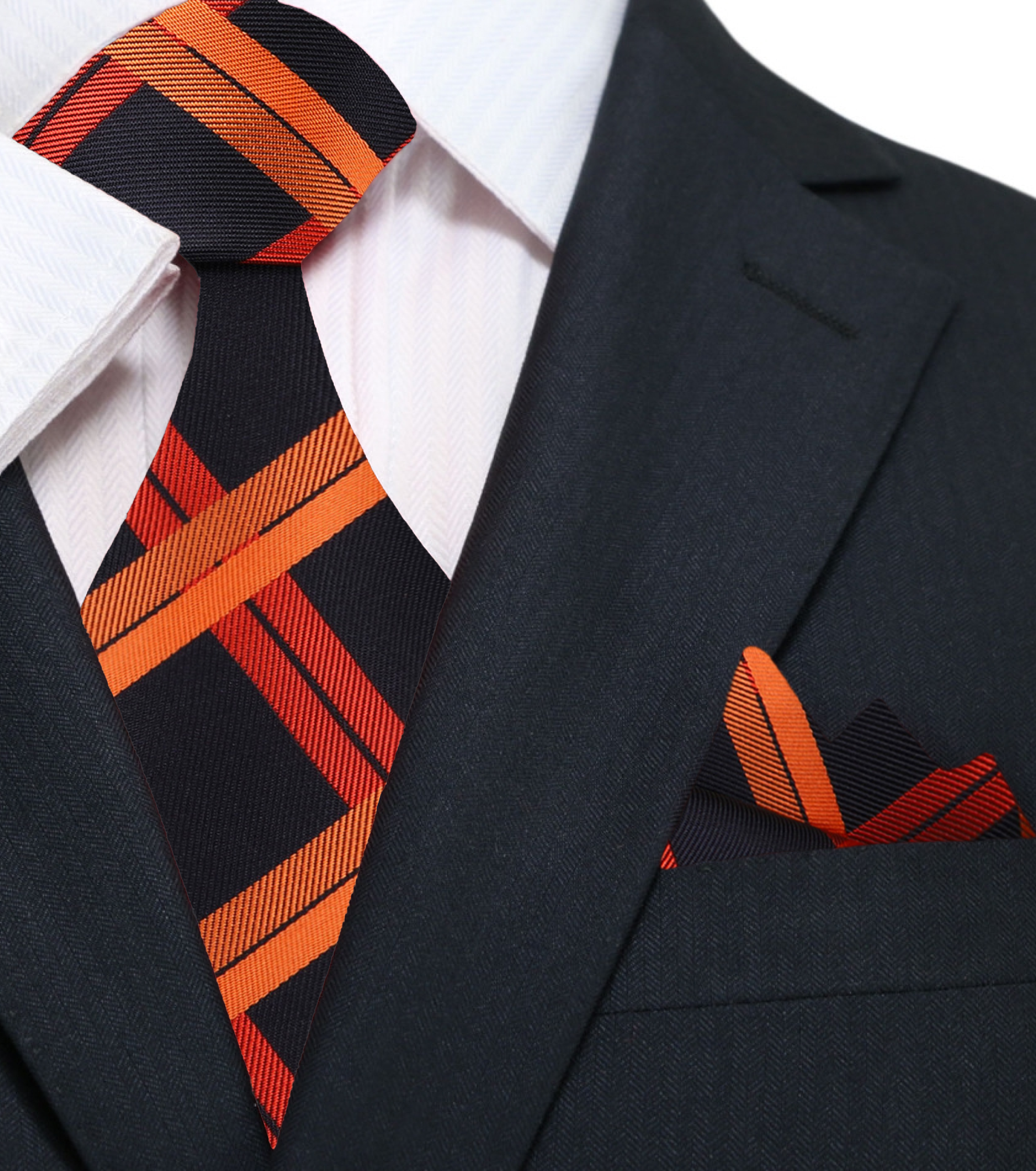 Black and orange plaid silk necktie draped over a suit for formal occasion