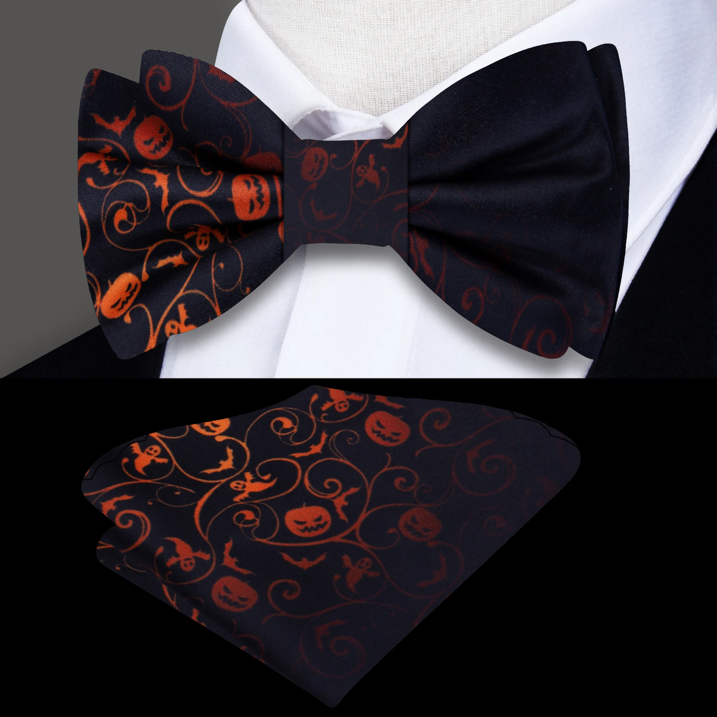 Model wearing a black and orange Halloween bow tie paired with a charcoal grey suit at a festive celebration.