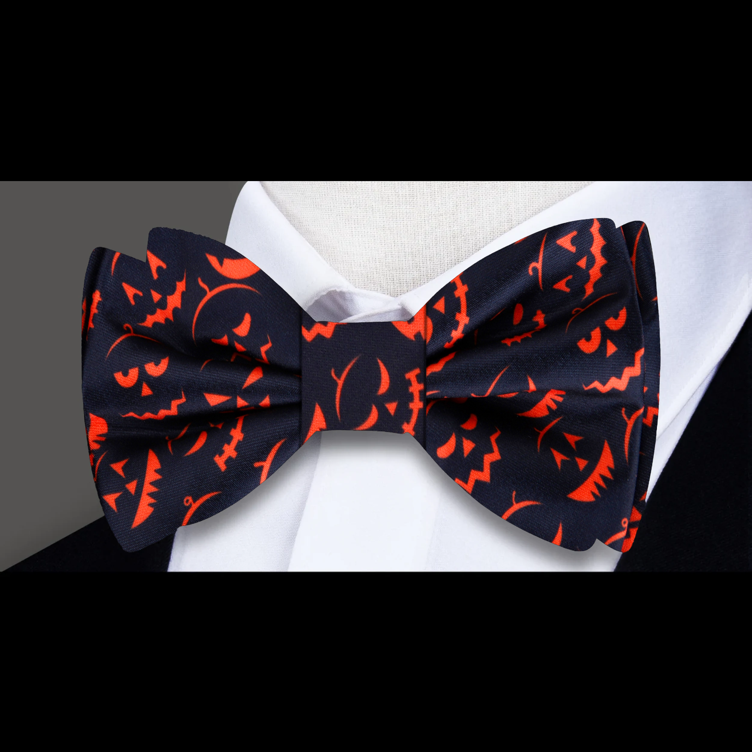 Model wearing a Halloween bow tie with a spooky costume