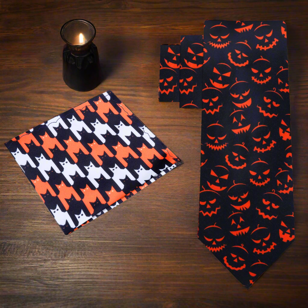 Festive jack-o-lantern silk necktie displaying vibrant colors for Halloween.