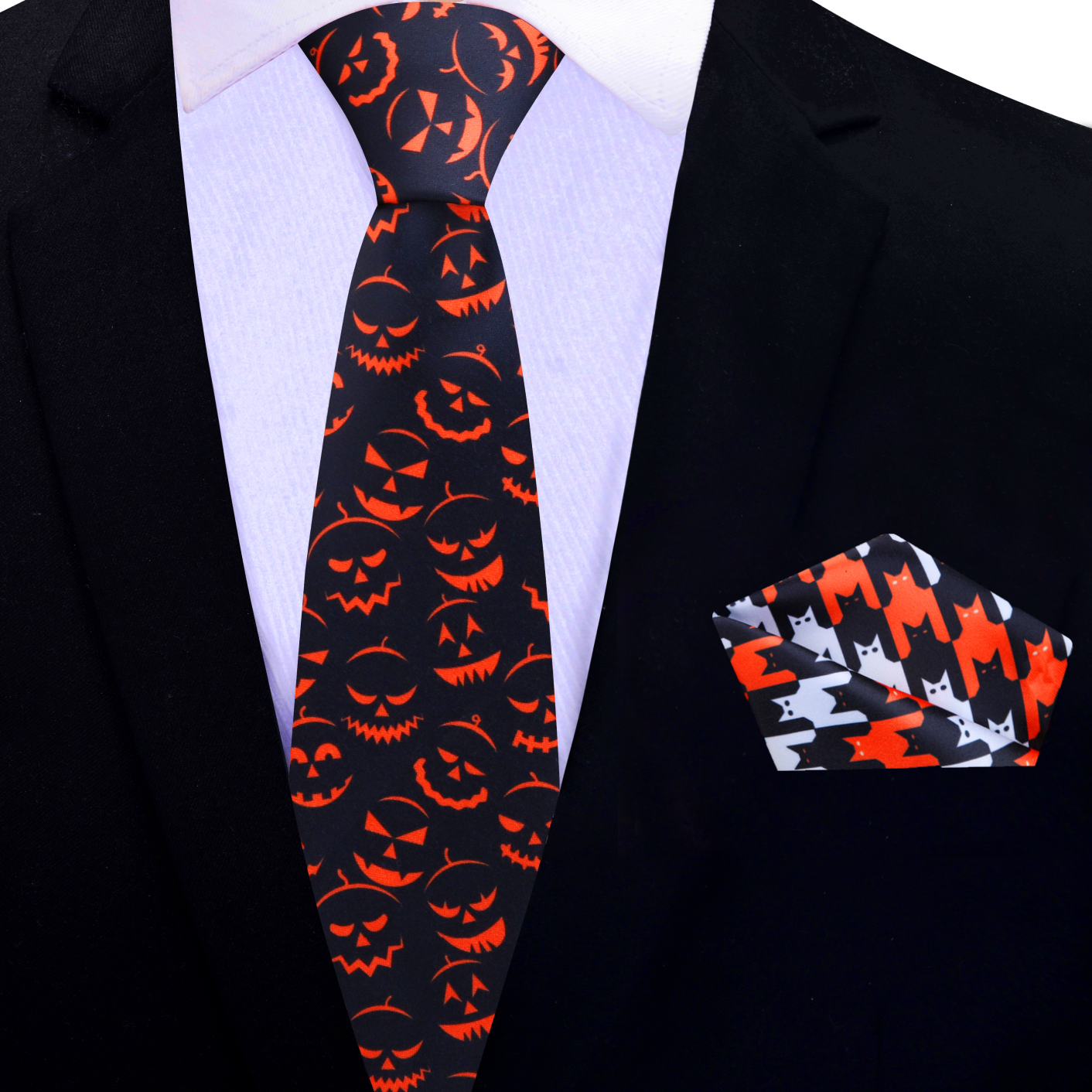 Model wearing a jack-o-lantern necktie at a Halloween party, complementing a navy suit.
