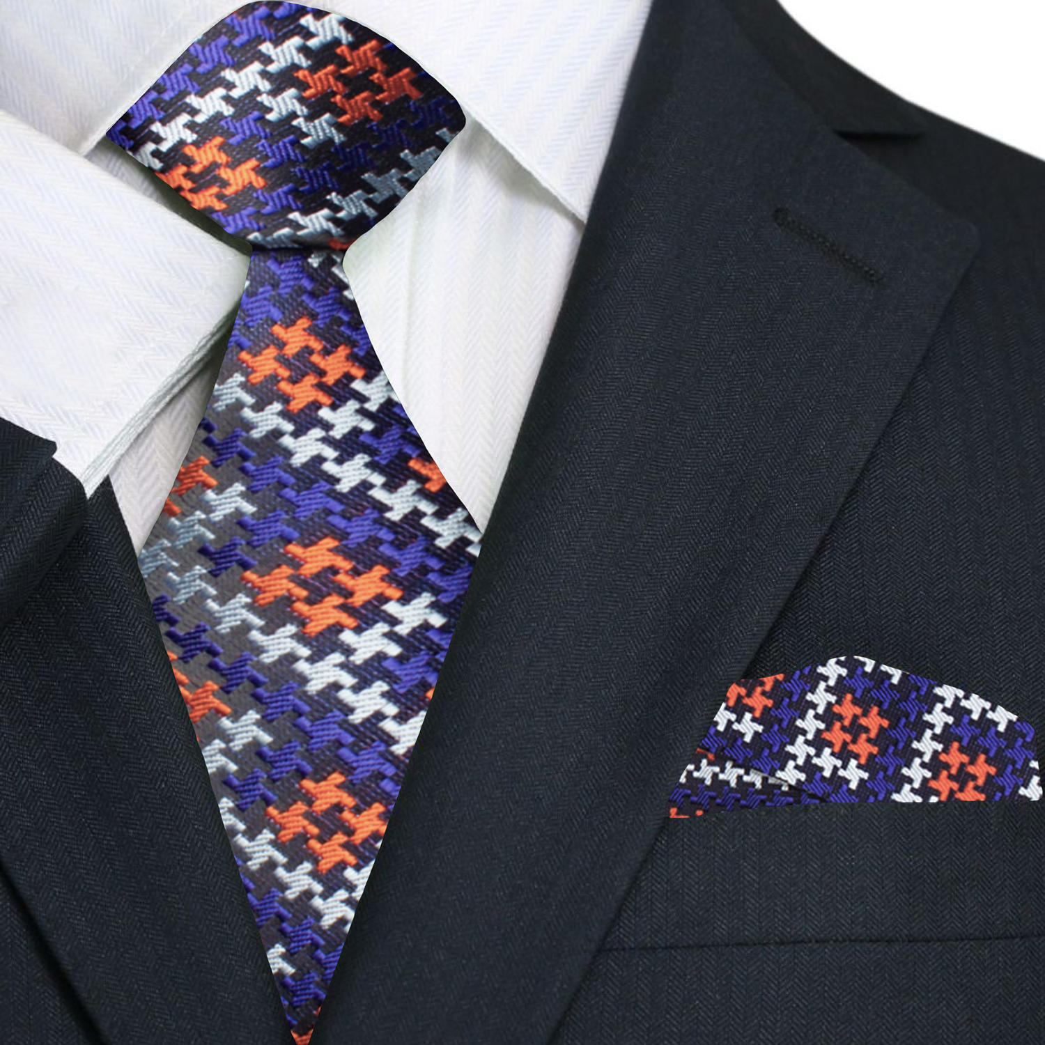 The elegant black silk tie displayed against a neutral suit, emphasizing its versatility.
