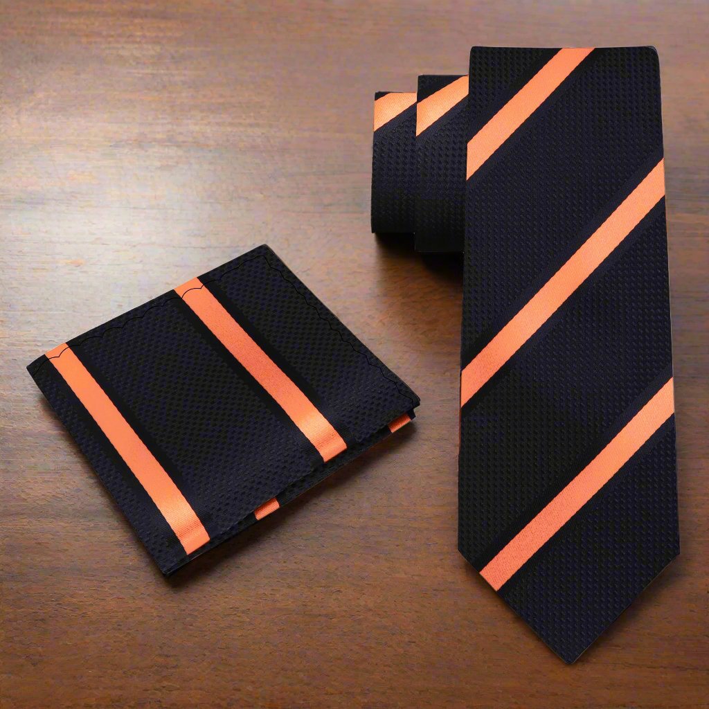 Close-up of mens stripe tie in navy blue and yellow, suitable for business wear