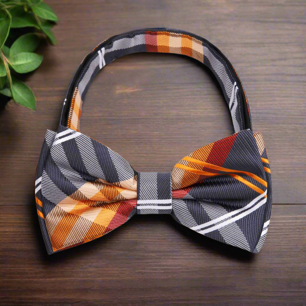 Group of friends wearing plaid bow ties at a casual wedding reception