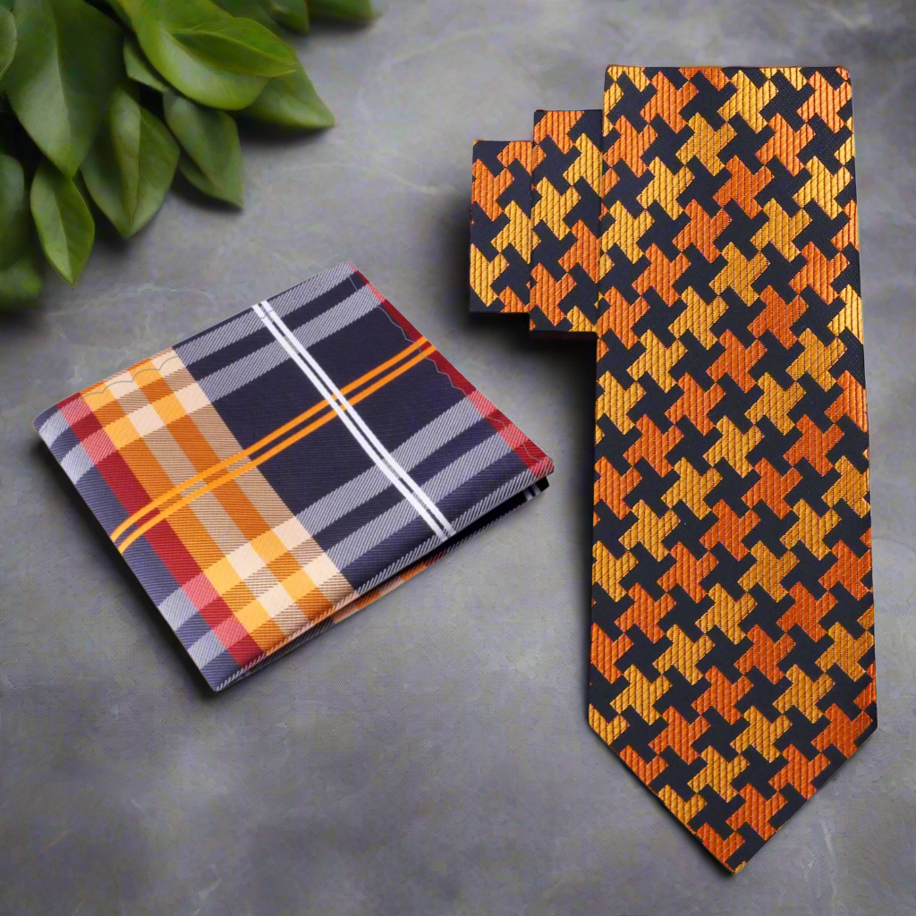 Model wearing orange and black tie for business meetings with white dress shirt and blazer
