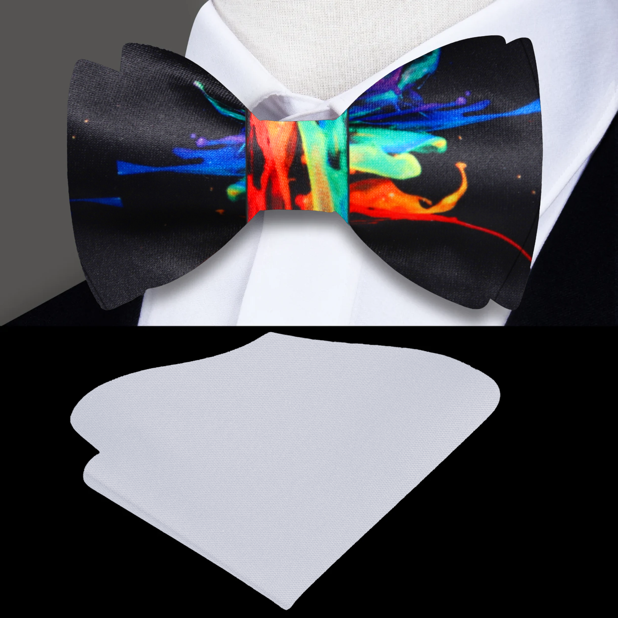 Close-up of black silk bow tie with vibrant paint splash pattern, ideal for formal wear