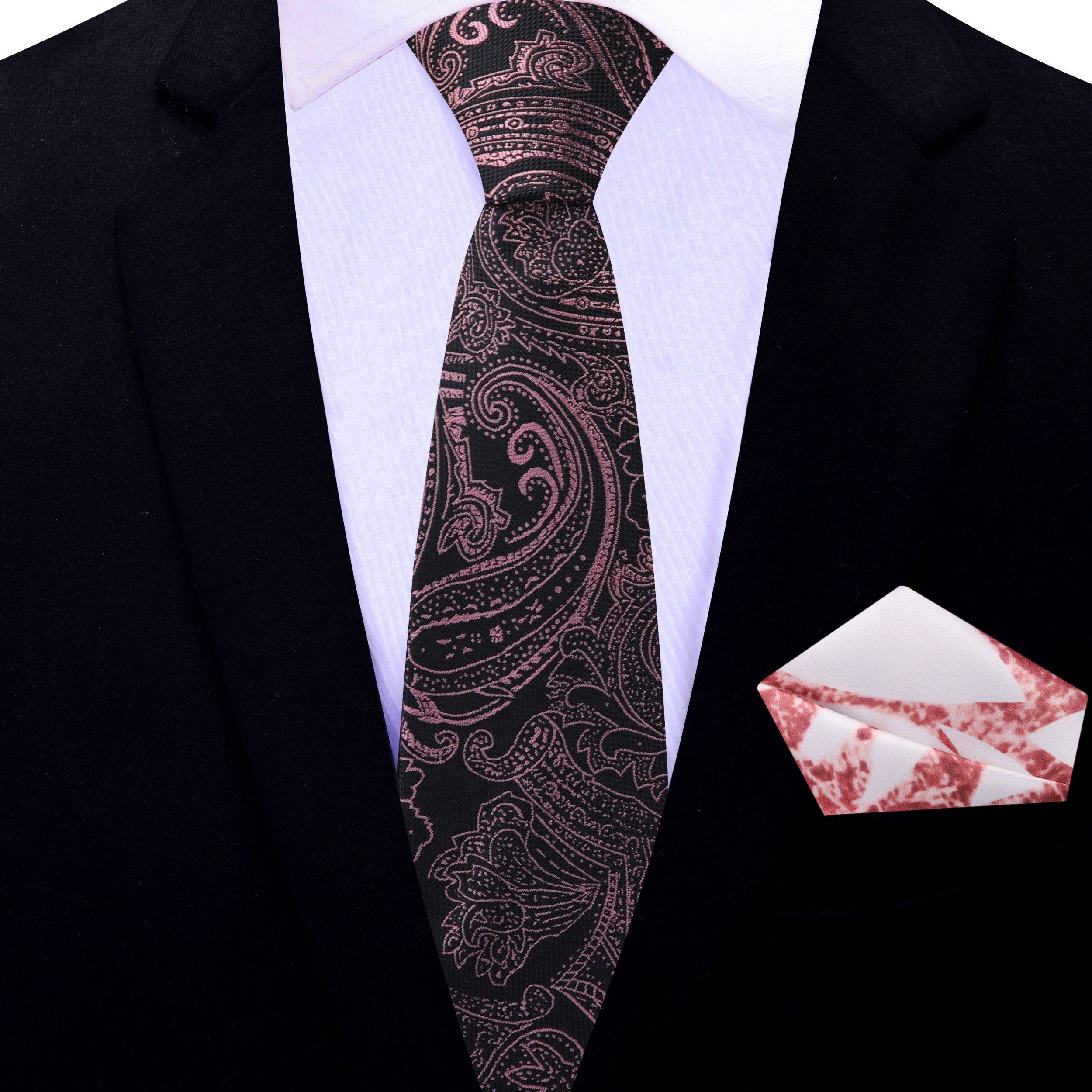 Stylish rose gold paisley necktie paired with a charcoal grey suit, perfect for weddings.
